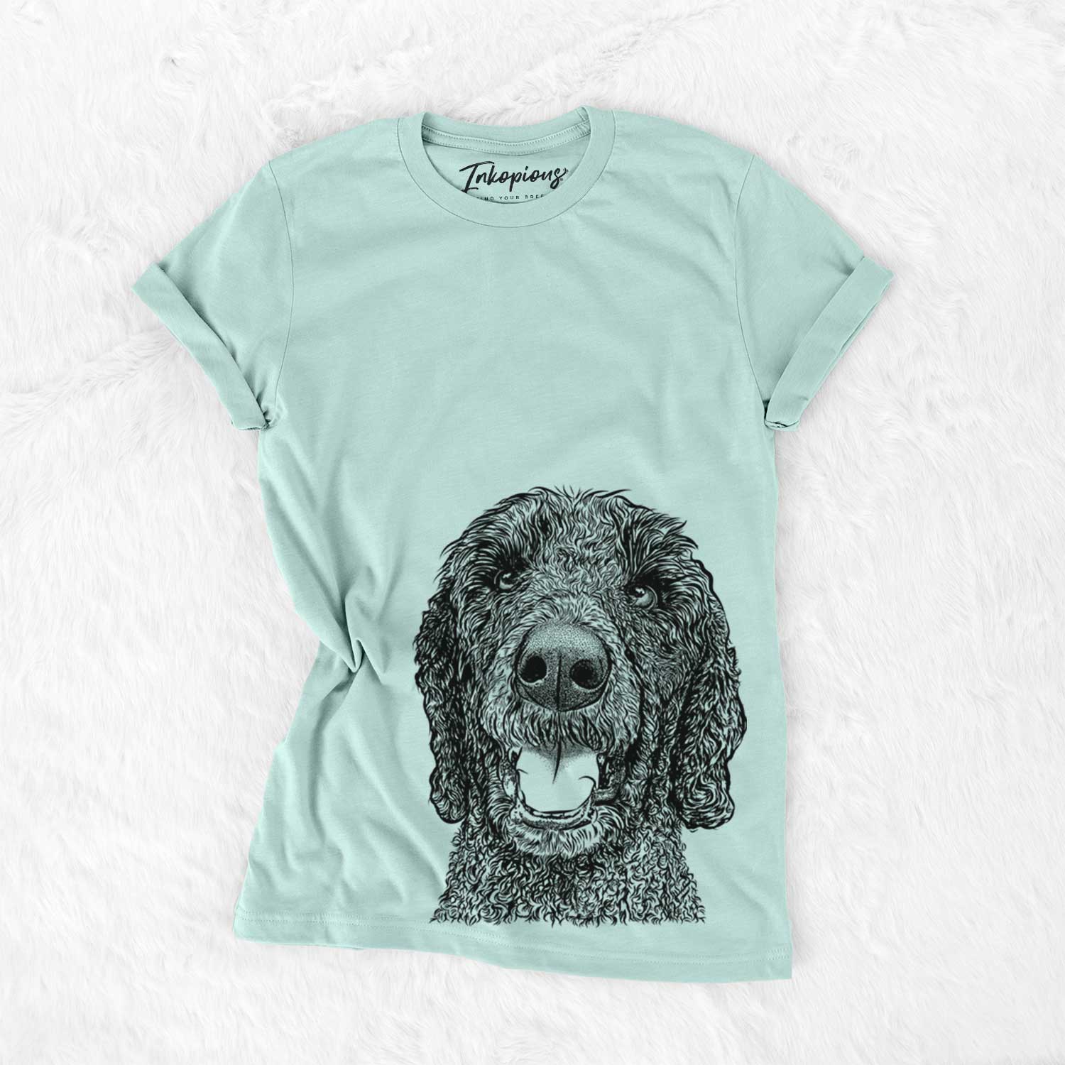 Hand-drawn sketch of Obi James the Goldendoodle on a Heather Sage Unisex crewneck
