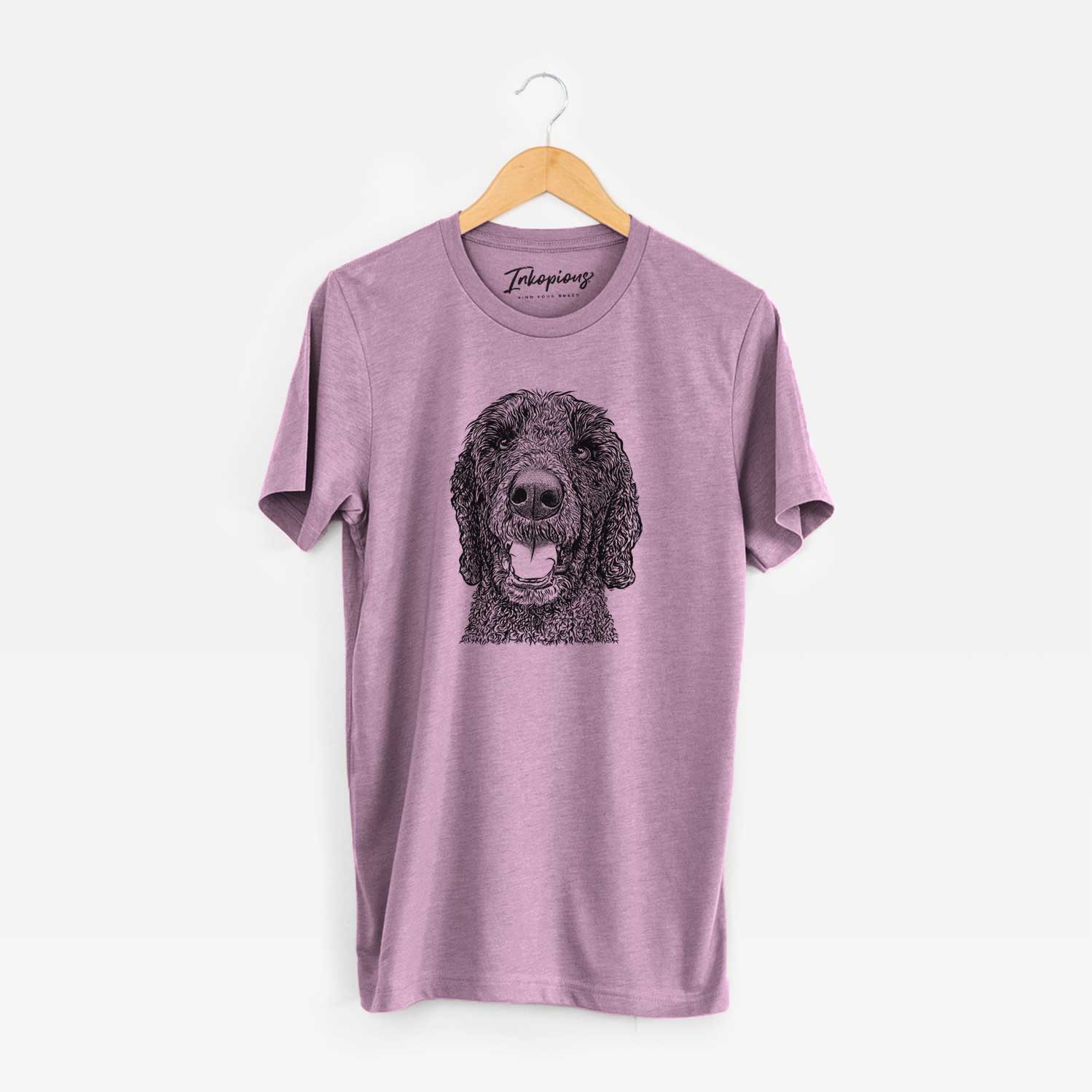 Hand-drawn sketch of Obi James the Goldendoodle on an Orchid Unisex crewneck