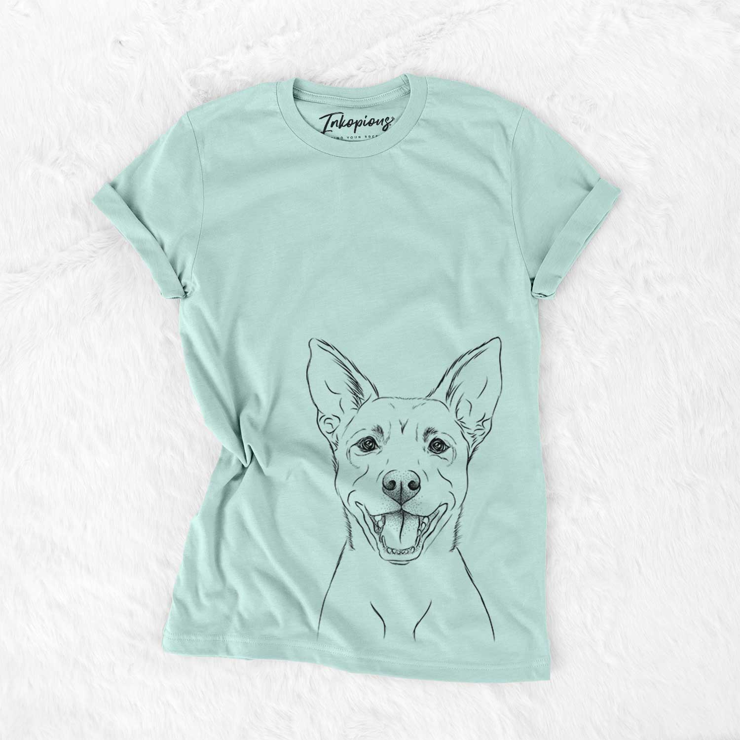 Hand-drawn sketch of Orange the Carolina Dog on a Heather Sage Bella Canvas Unisex Crewneck