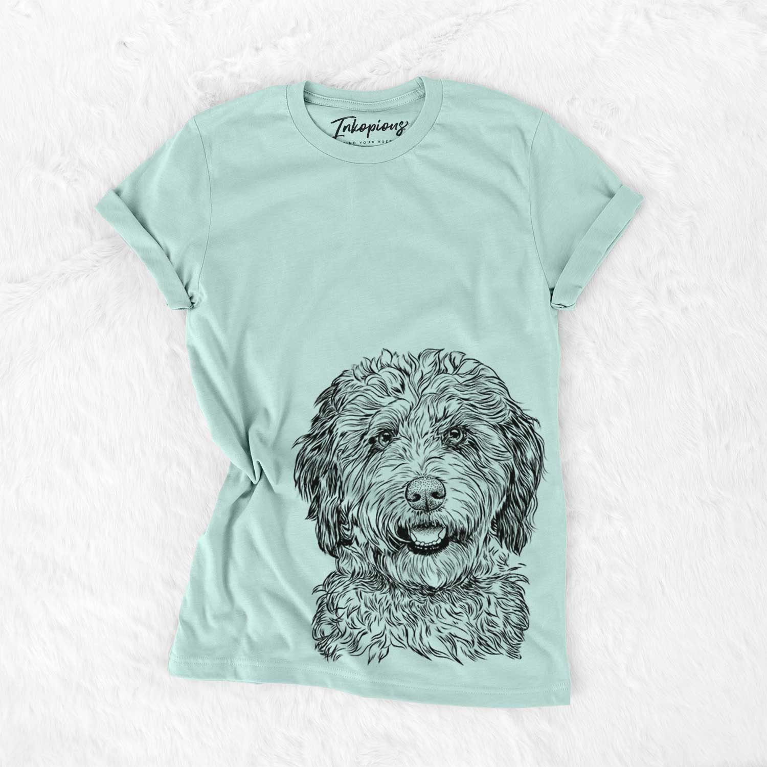 Hand-drawn sketch of Palmer the Aussiedoodle on a Heather Sage Bella Canvas Unisex Crewneck