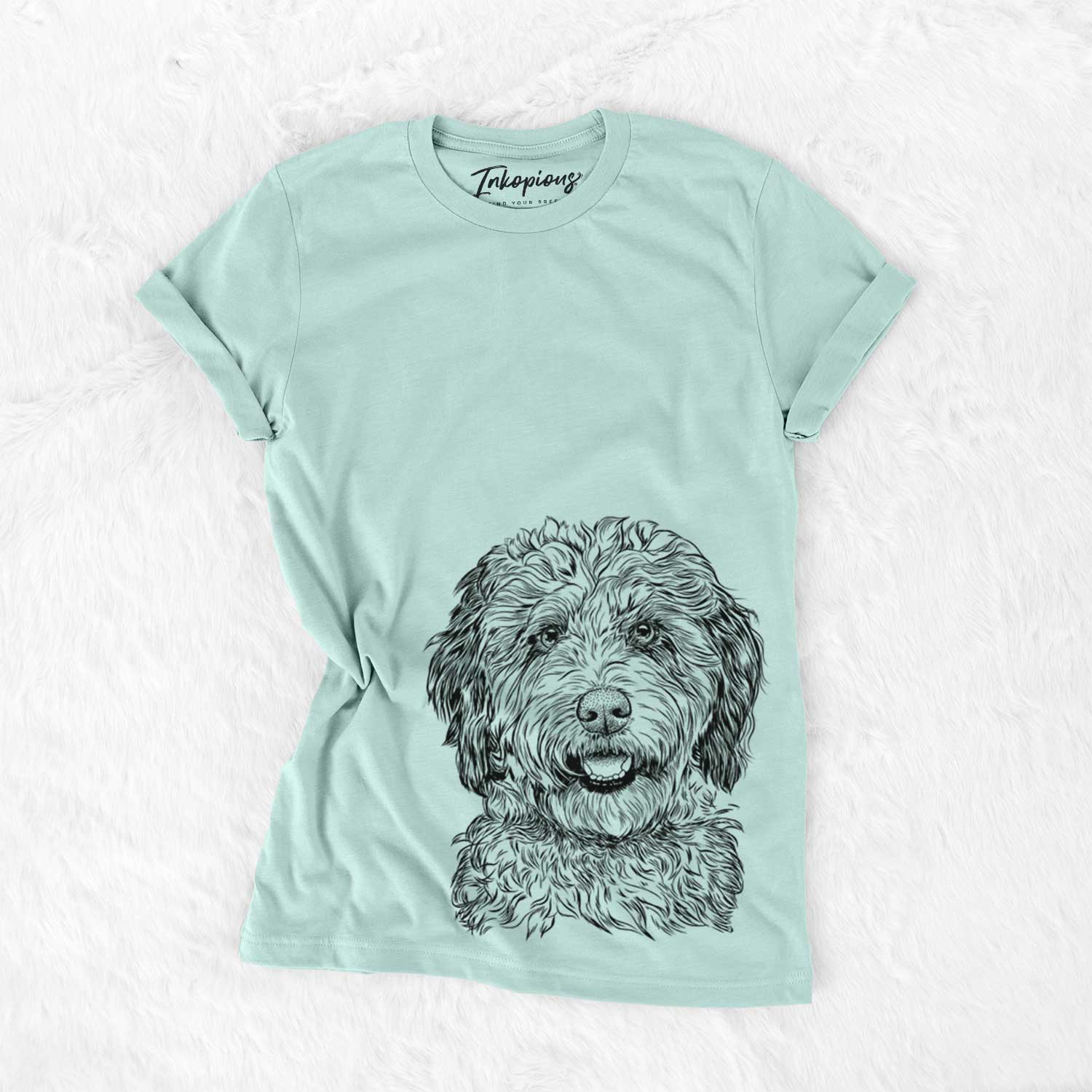 Hand-drawn sketch of Palmer the Aussiedoodle on a Heather Sage Unisex crewneck