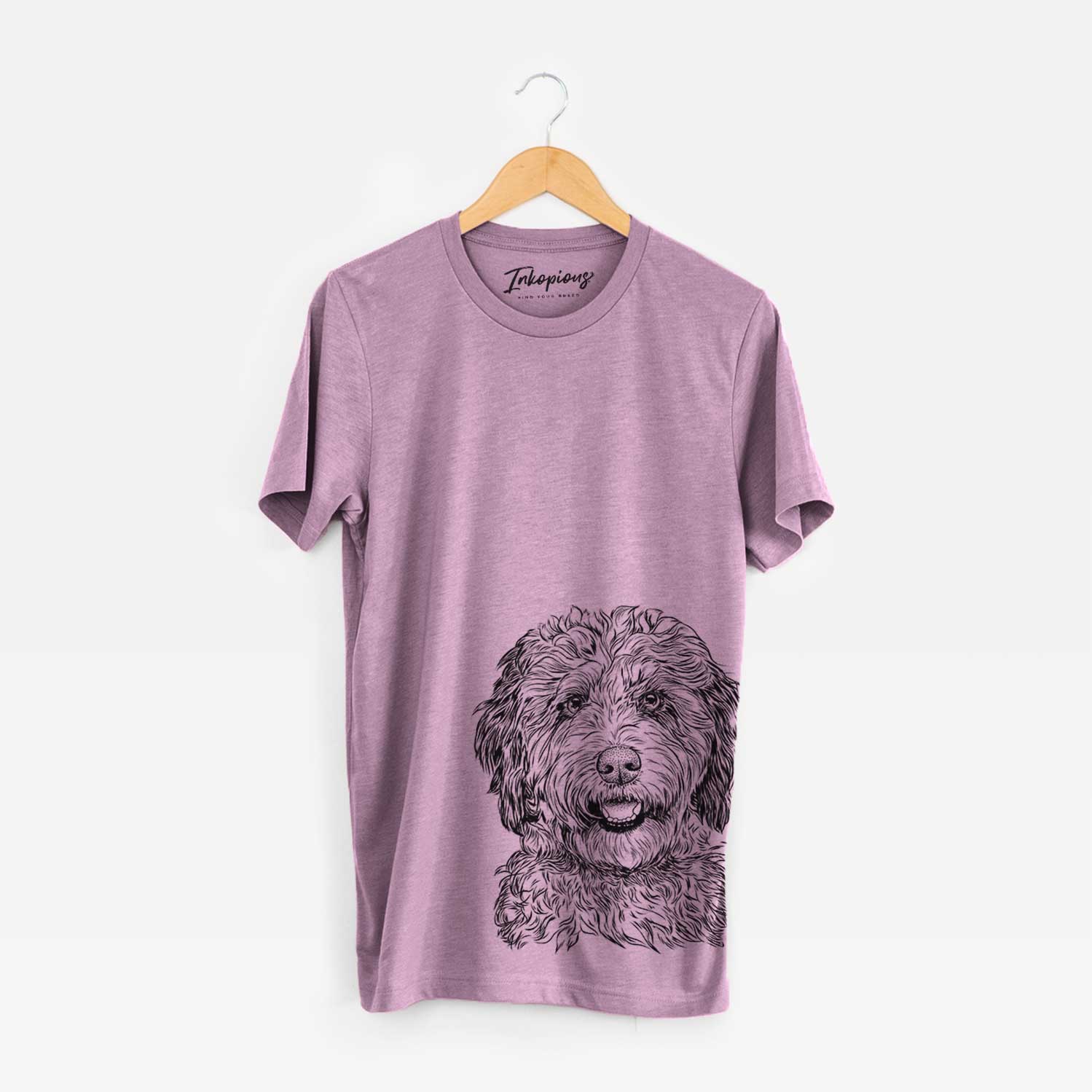 Hand-drawn sketch of Palmer the Aussiedoodle on an Orchid Bella Canvas Unisex Crewneck