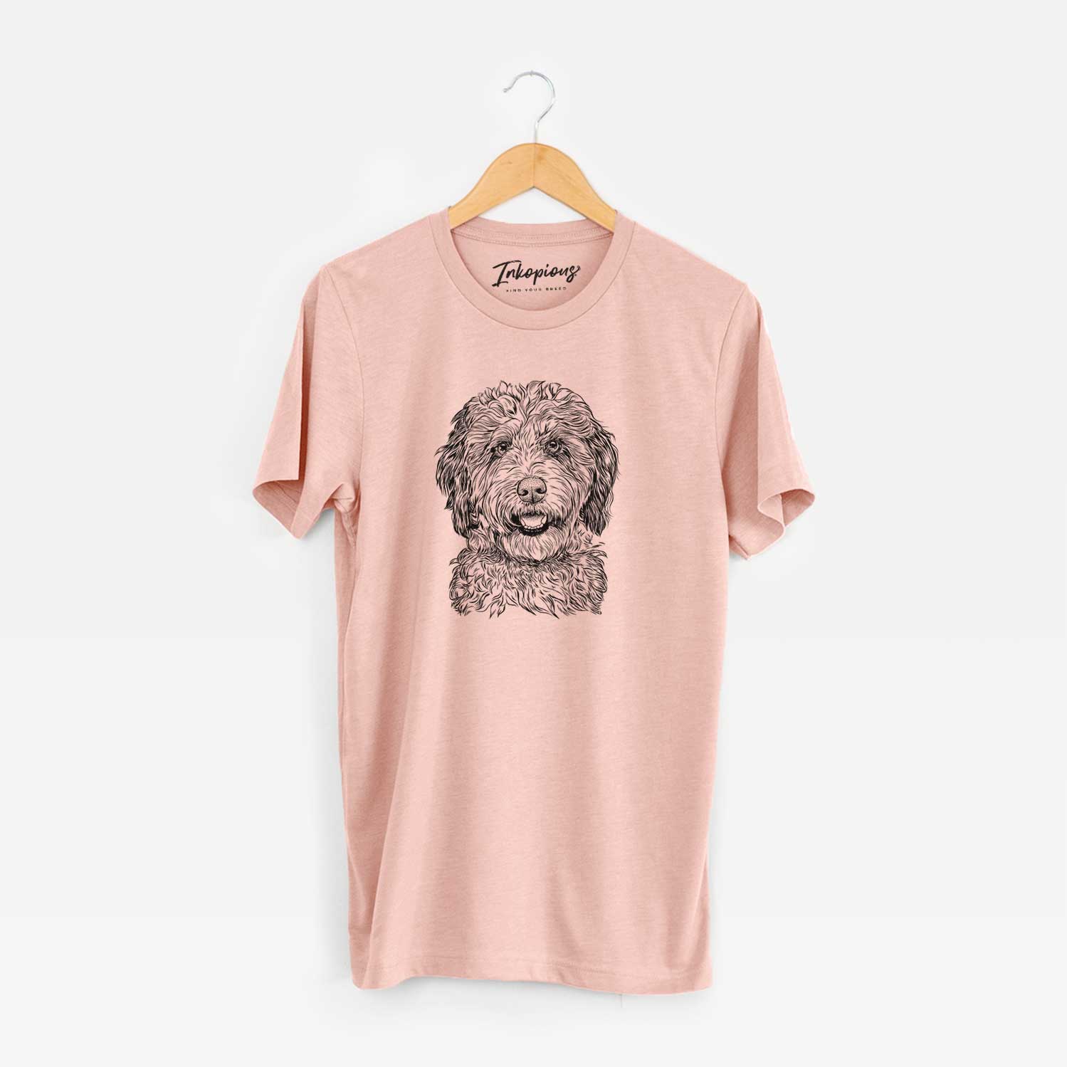 Hand-drawn sketch of Palmer the Aussiedoodle on a Peach Unisex crewneck
