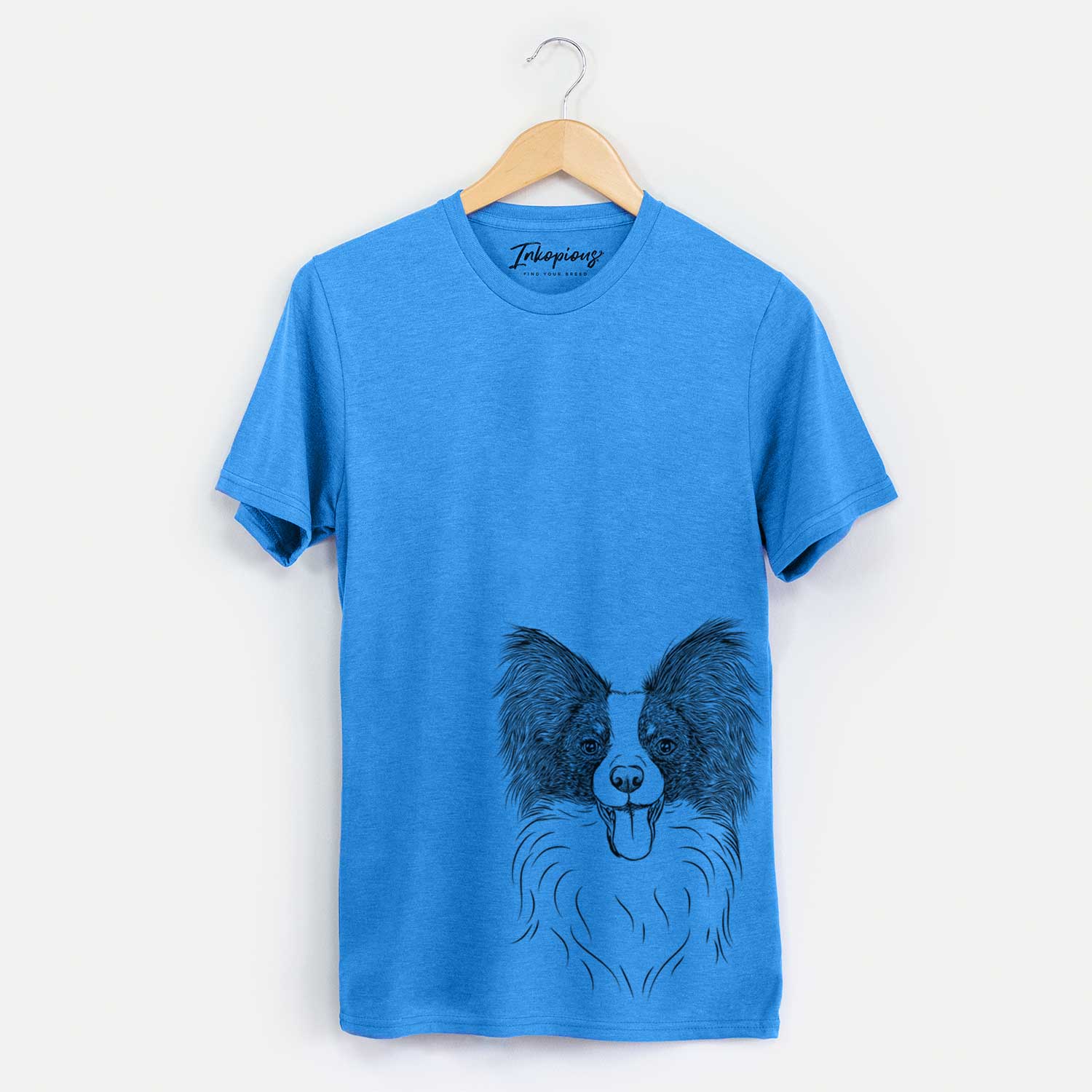 Hand-drawn sketch of Patrick the Papillon on a Blue Unisex crewneck