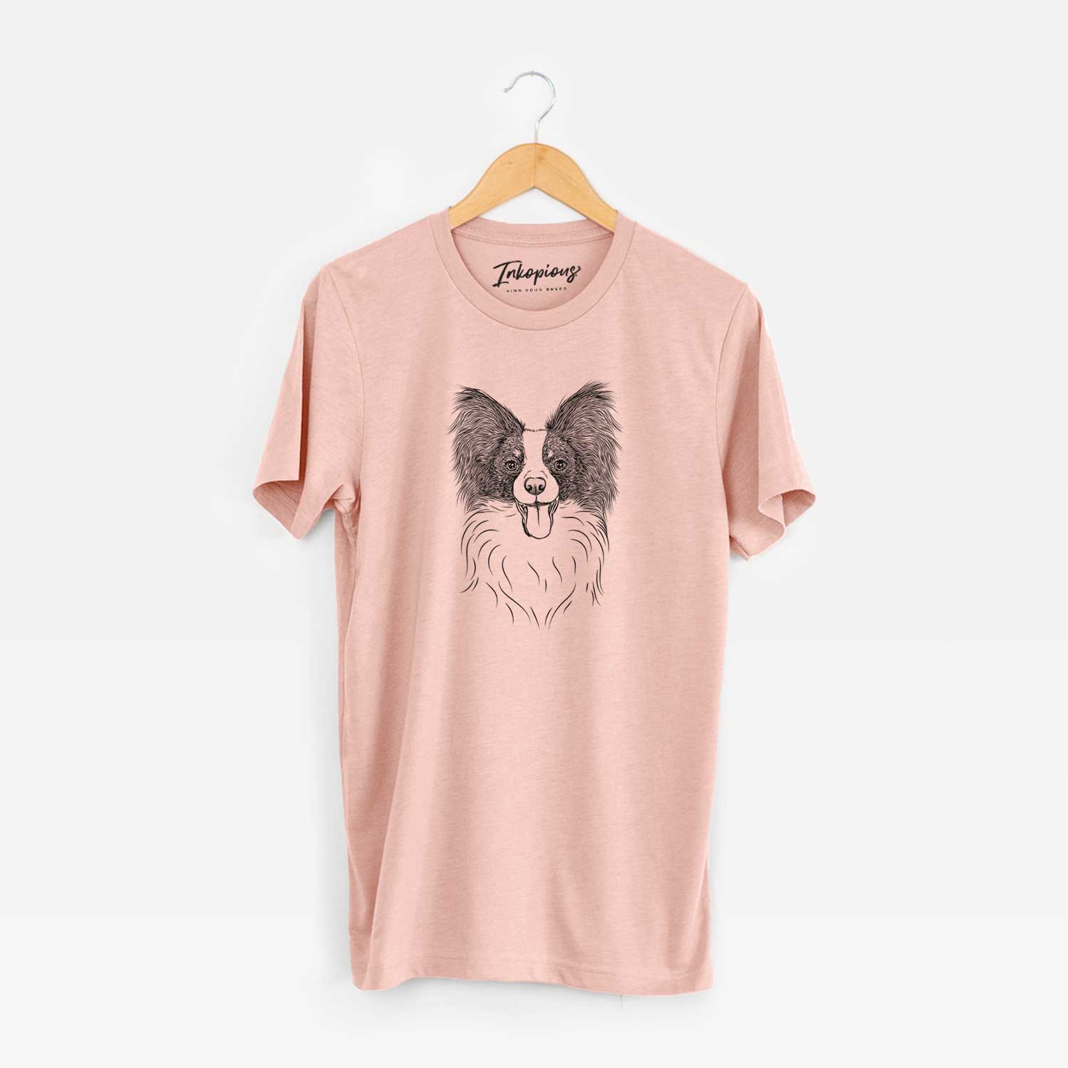 Hand-drawn sketch of Patrick the Papillon on a Peach Unisex crewneck
