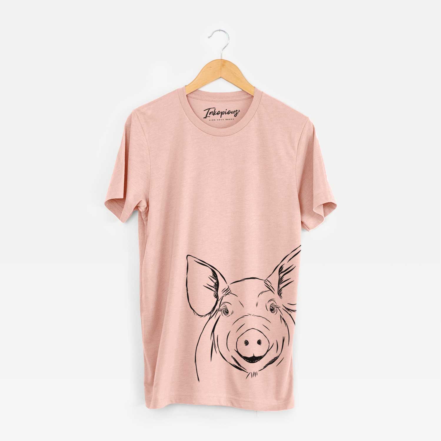 Hand-drawn sketch of Perry the Pig on a Peach Bella Canvas Unisex Crewneck