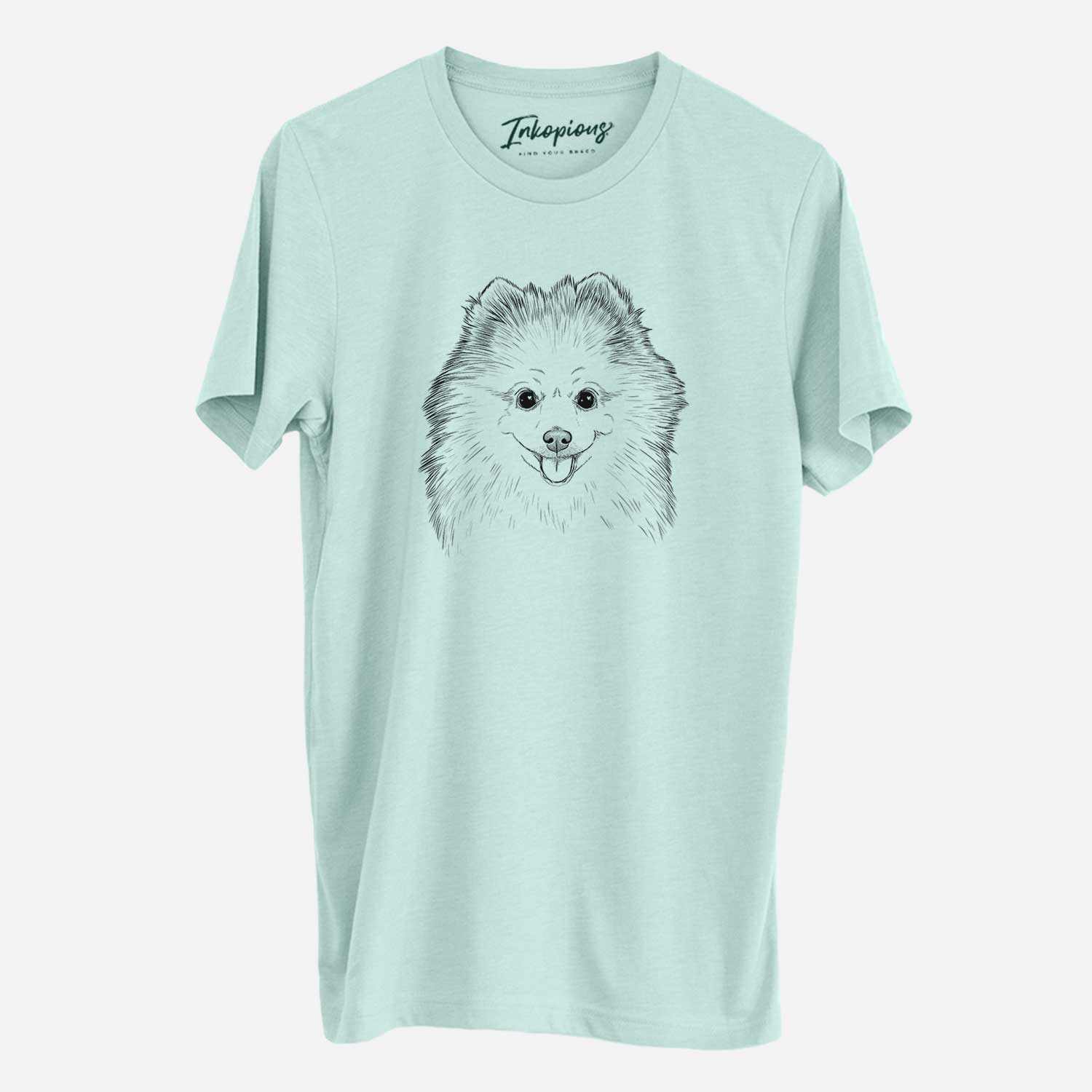 Hand-drawn sketch of Piper Jo the Pomeranian on a Heather Sage Unisex crewneck