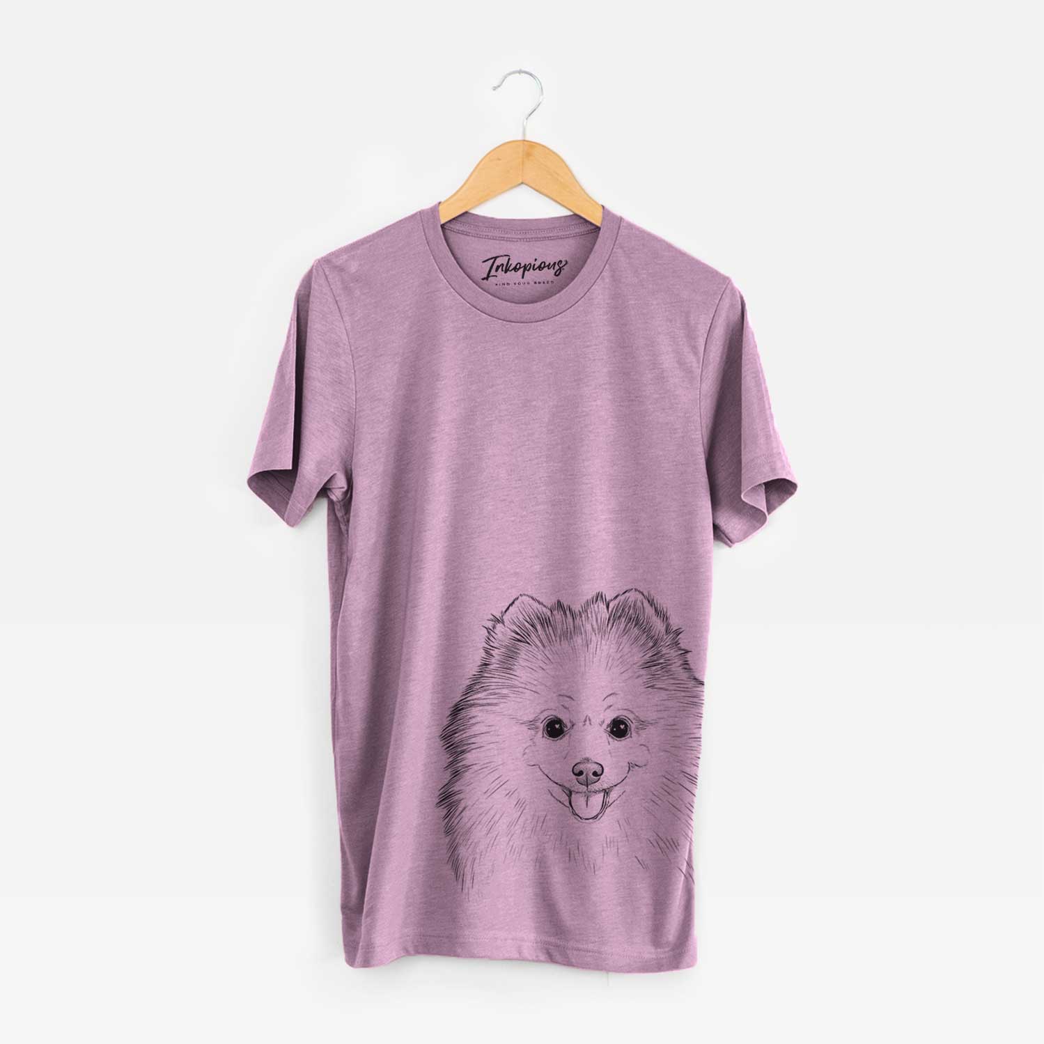 Hand-drawn sketch of Piper Jo the Pomeranian on an Orchid Unisex crewneck