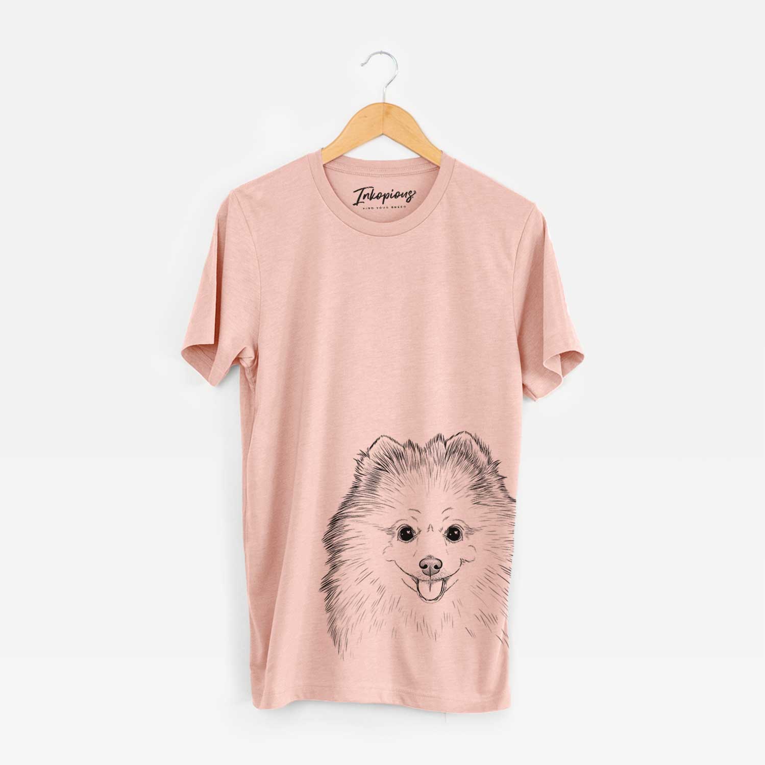 Hand-drawn sketch of Piper Jo the Pomeranian on a Peach Unisex crewneck