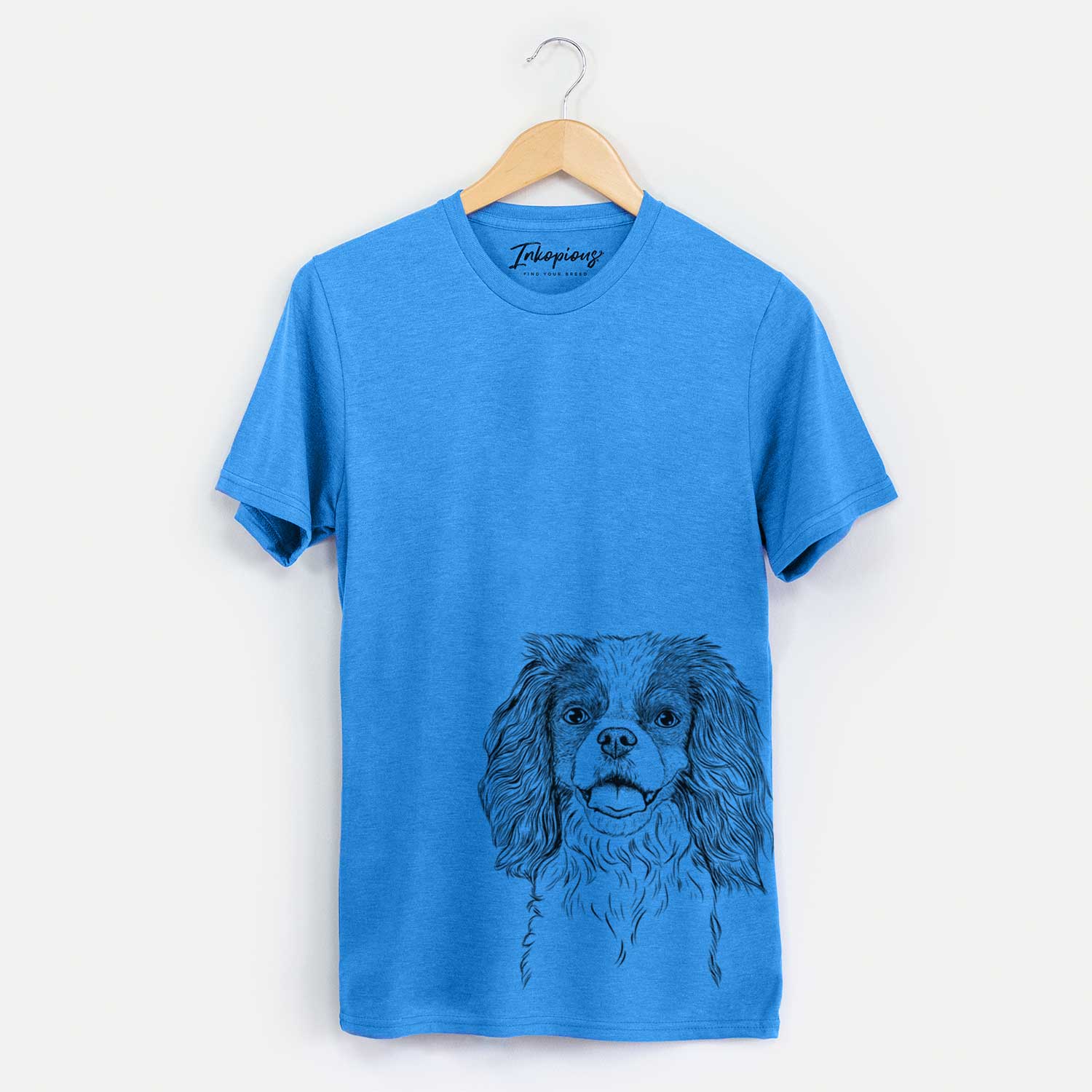 Hand-drawn sketch of Poppy the Cavalier King Charles Spaniel on a Blue Unisex crewneck
