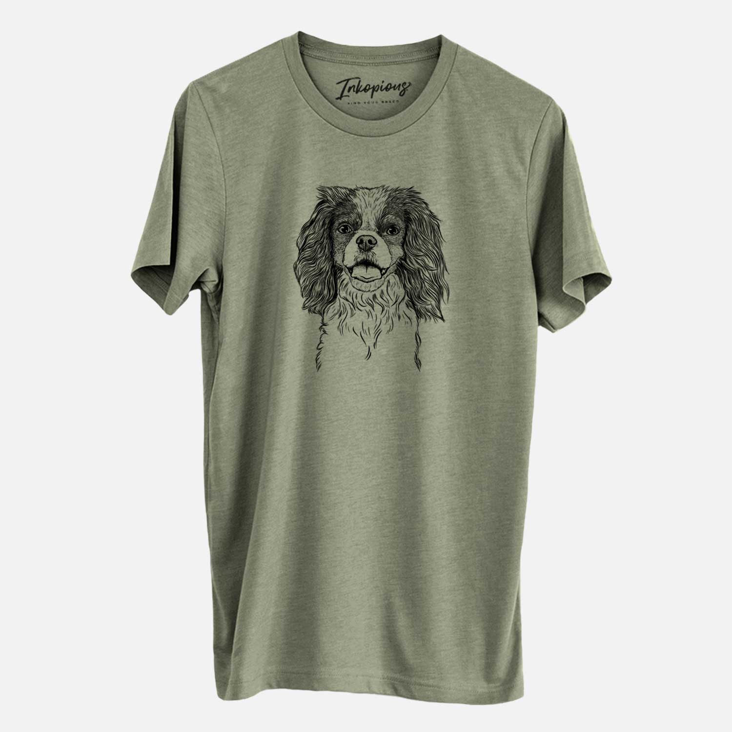 Hand-drawn sketch of Poppy the Cavalier King Charles Spaniel on an Olive Unisex crewneck