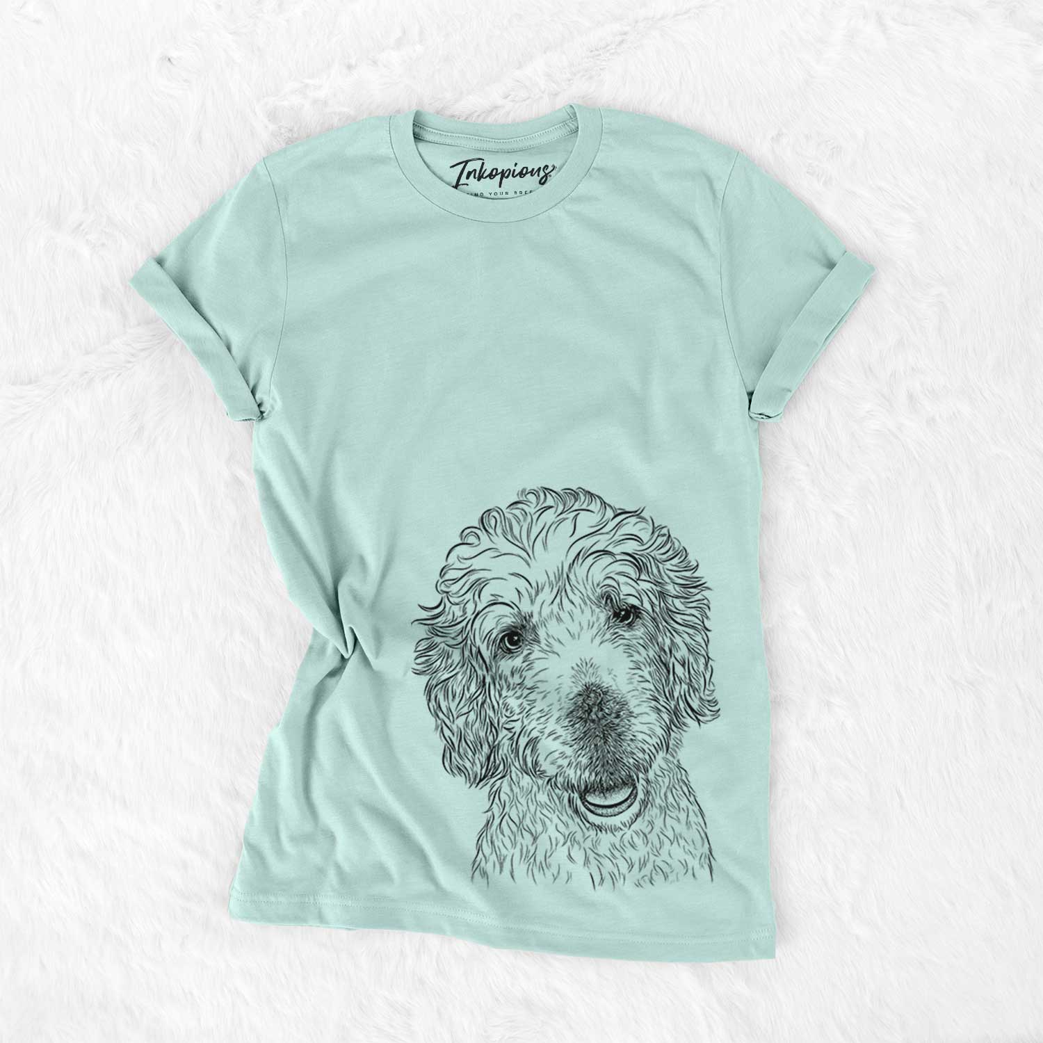 Hand-drawn sketch of Preston the Labradoodle on a Heather Sage Unisex crewneck