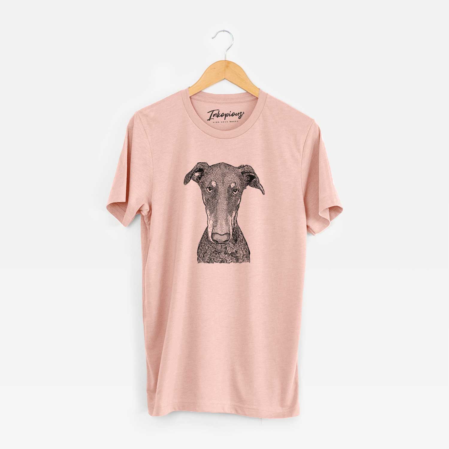 Hand-drawn sketch of Princess Fiona the Doberman Pinscher on a Peach Unisex crewneck