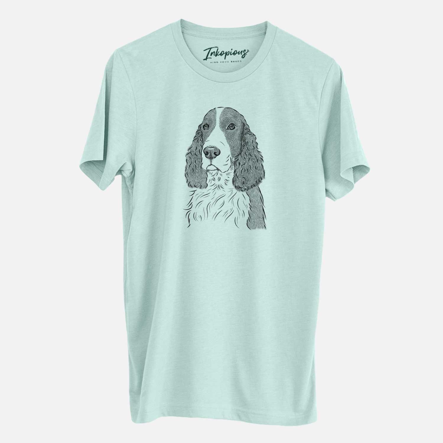 Hand-drawn sketch of Quincy the English Springer Spaniel on a Heather Sage Unisex crewneck