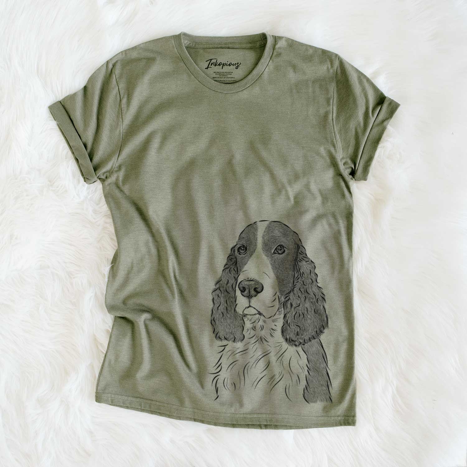 Hand-drawn sketch of Quincy the English Springer Spaniel on an Olive Unisex crewneck