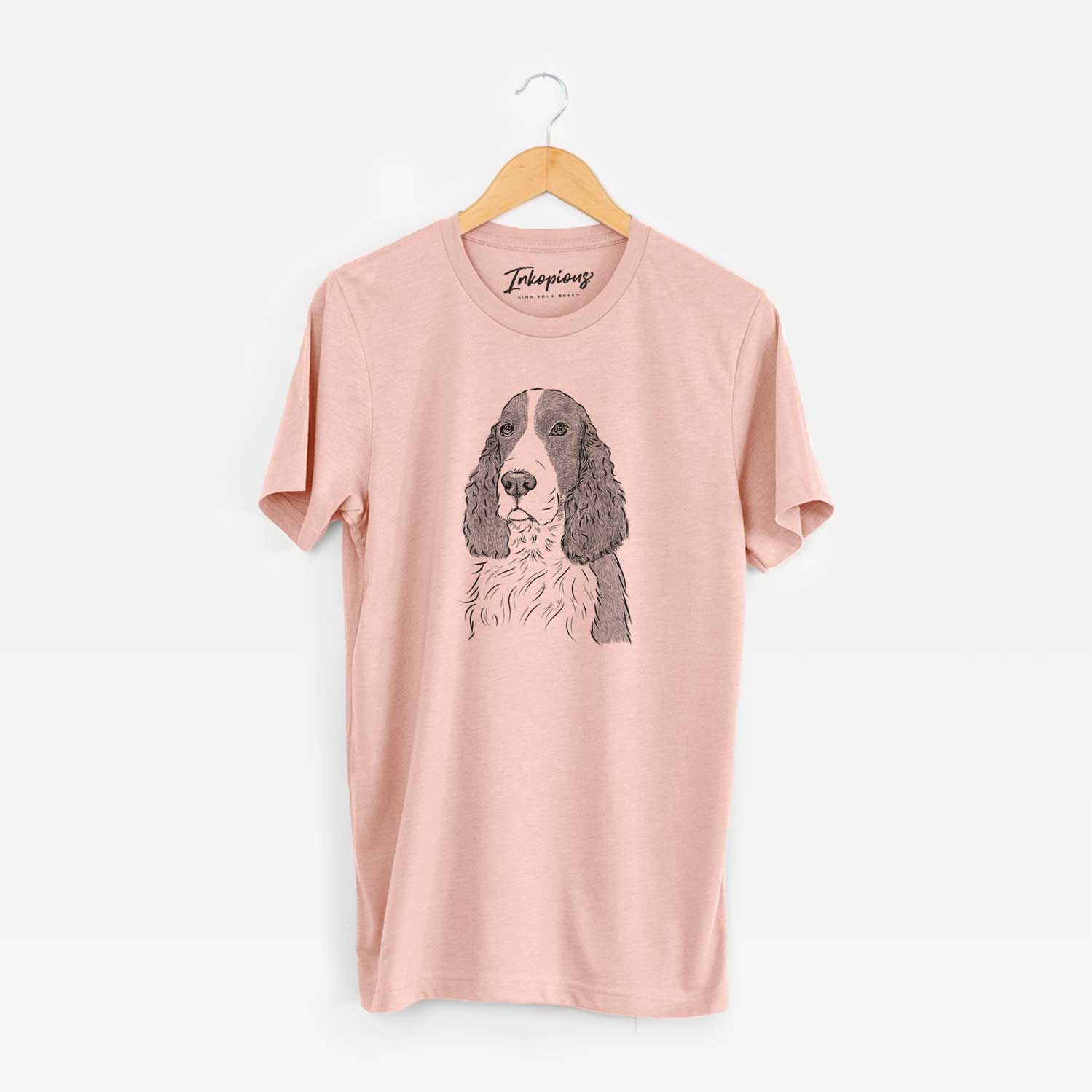 Hand-drawn sketch of Quincy the English Springer Spaniel on a Peach Unisex crewneck