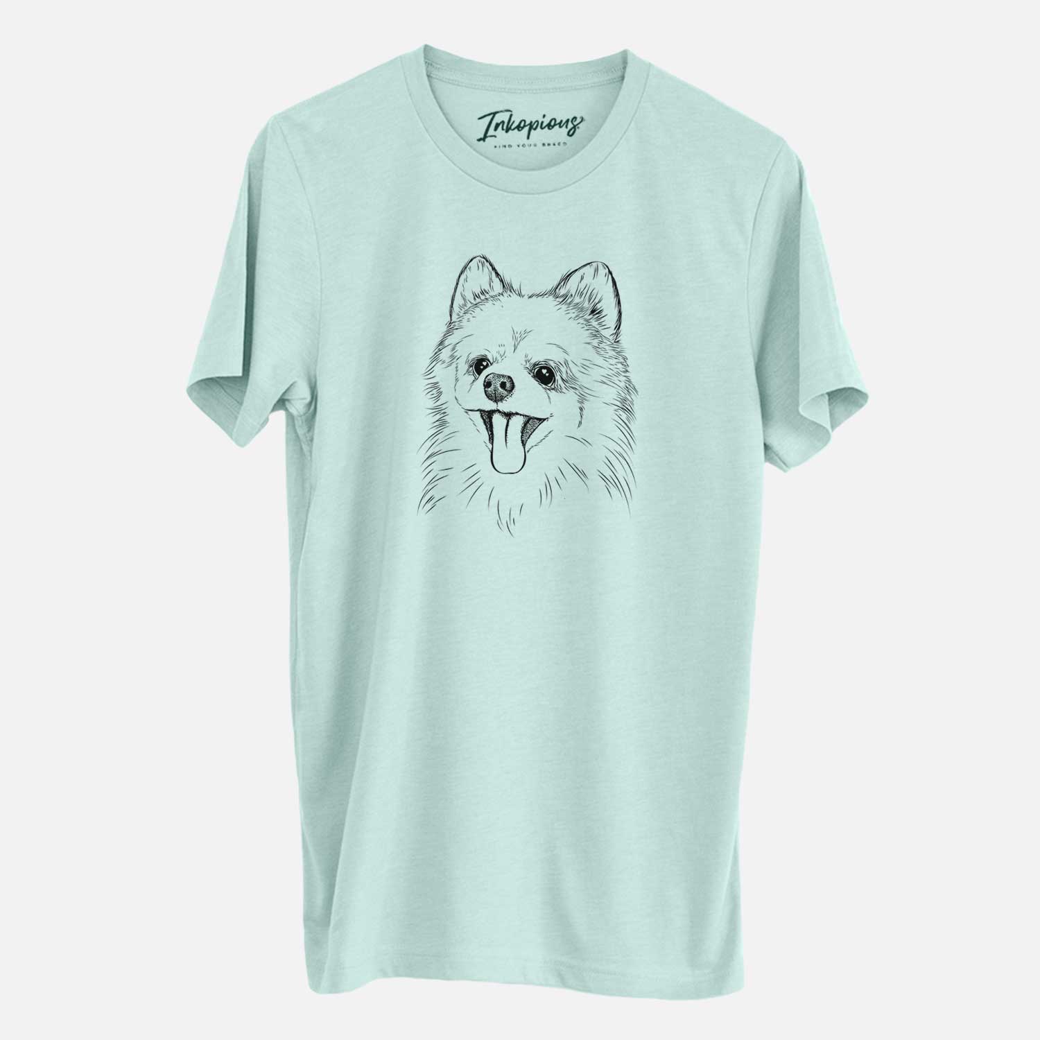 Hand-drawn sketch of Quinn the Pomeranian on a Heather Sage Unisex crewneck