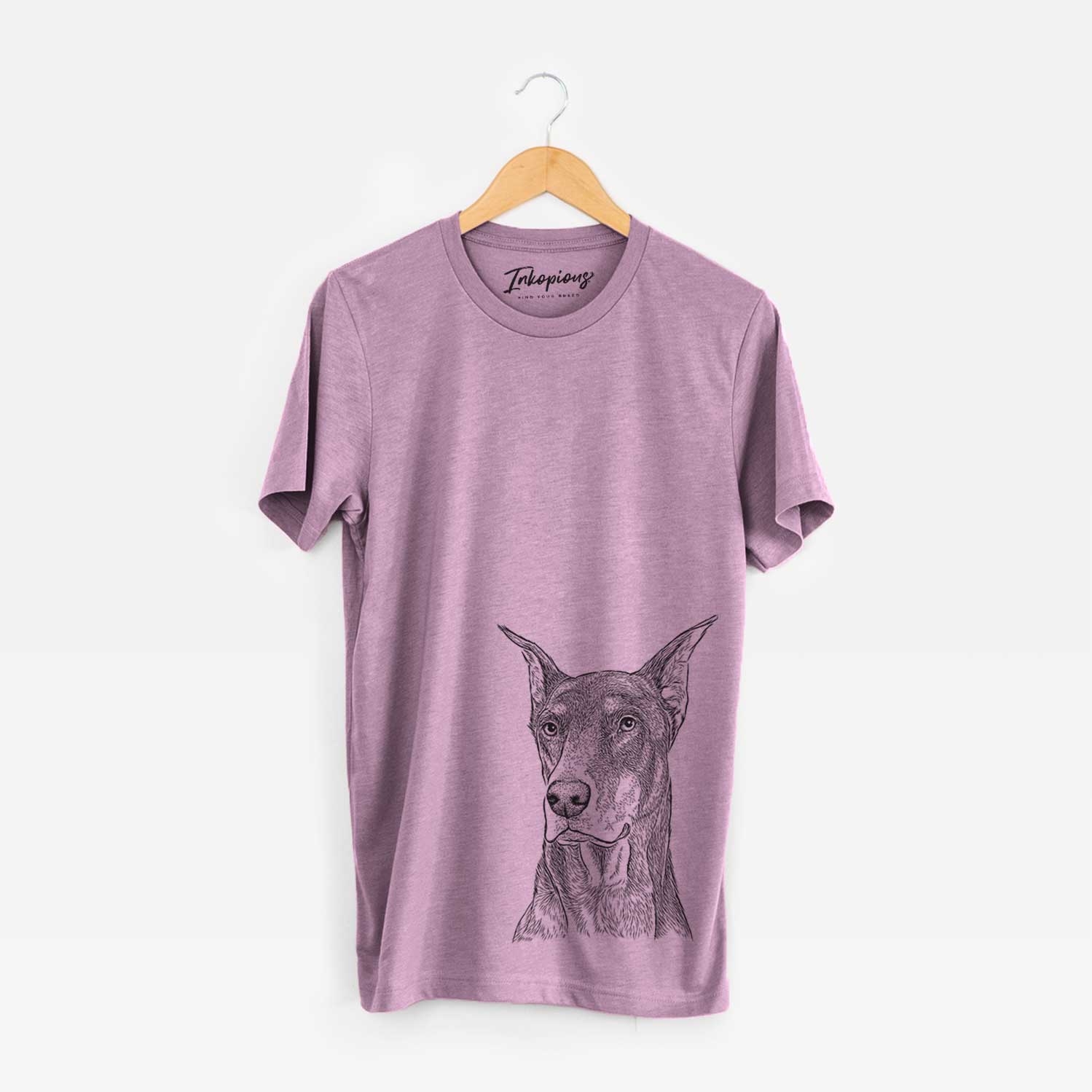 Hand-drawn sketch of RJ the Doberman Pinscher on an Orchid Unisex crewneck