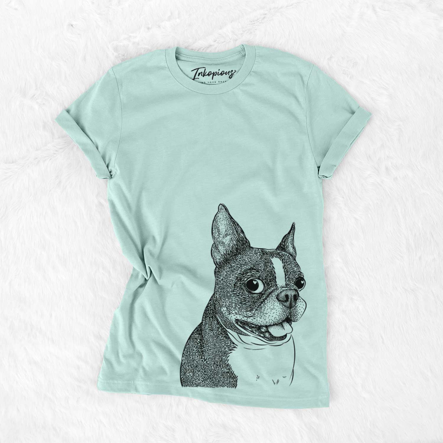 Hand-drawn sketch of Ralphie the Boston Terrier on a Heather Sage Unisex crewneck