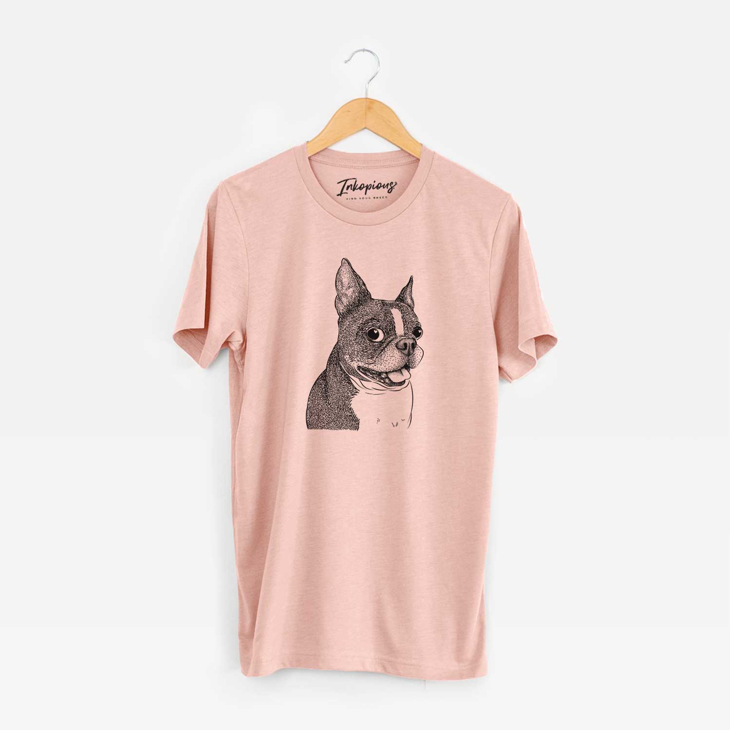 Hand-drawn sketch of Ralphie the Boston Terrier on a Peach Unisex crewneck