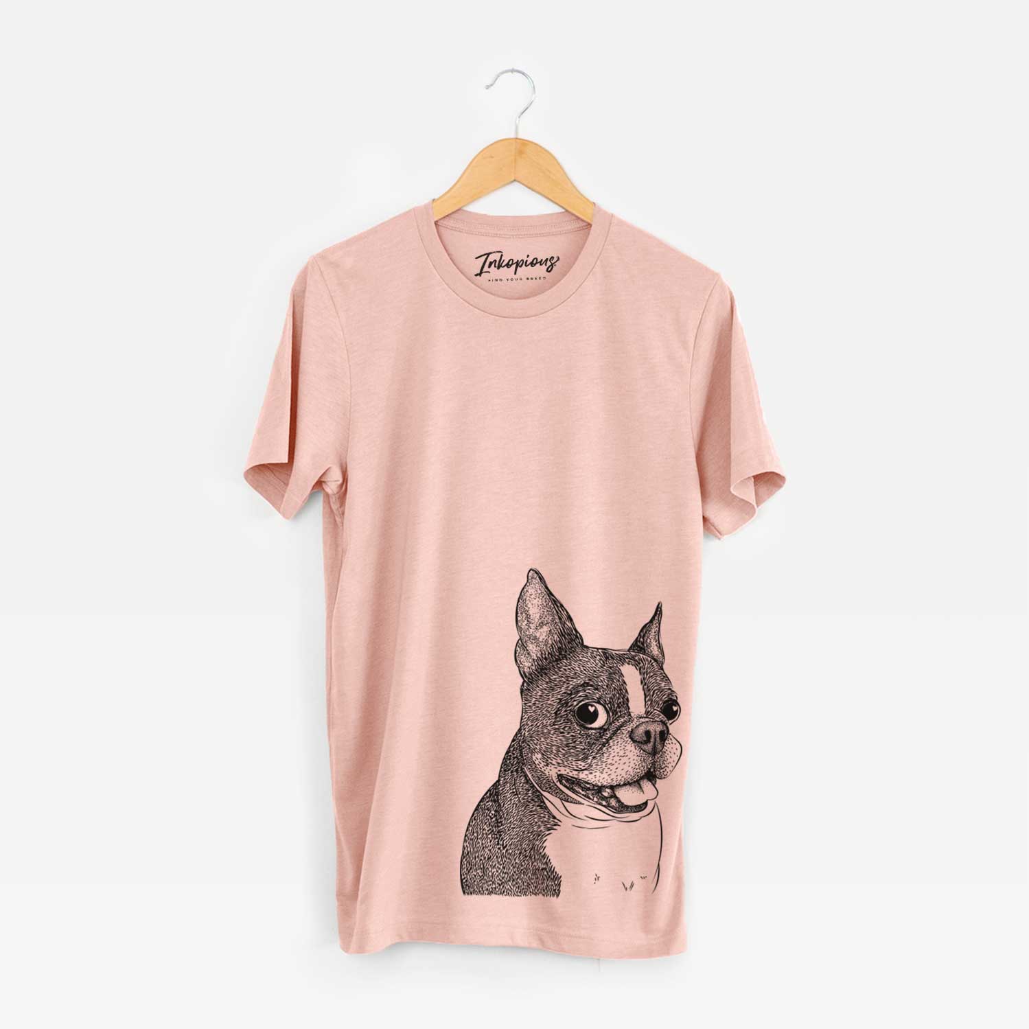 Hand-drawn sketch of Ralphie the Boston Terrier on a Peach Unisex crewneck