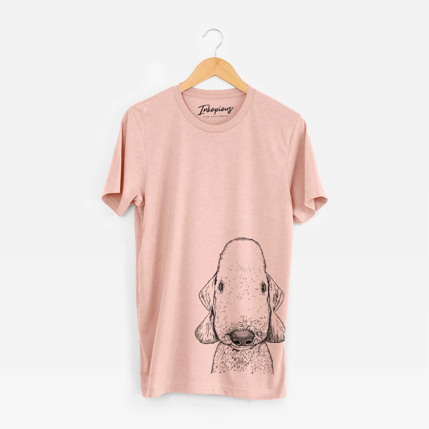 Hand-drawn sketch of Remington the Bedlington Terrier on a Peach Bella Canvas Unisex Crewneck