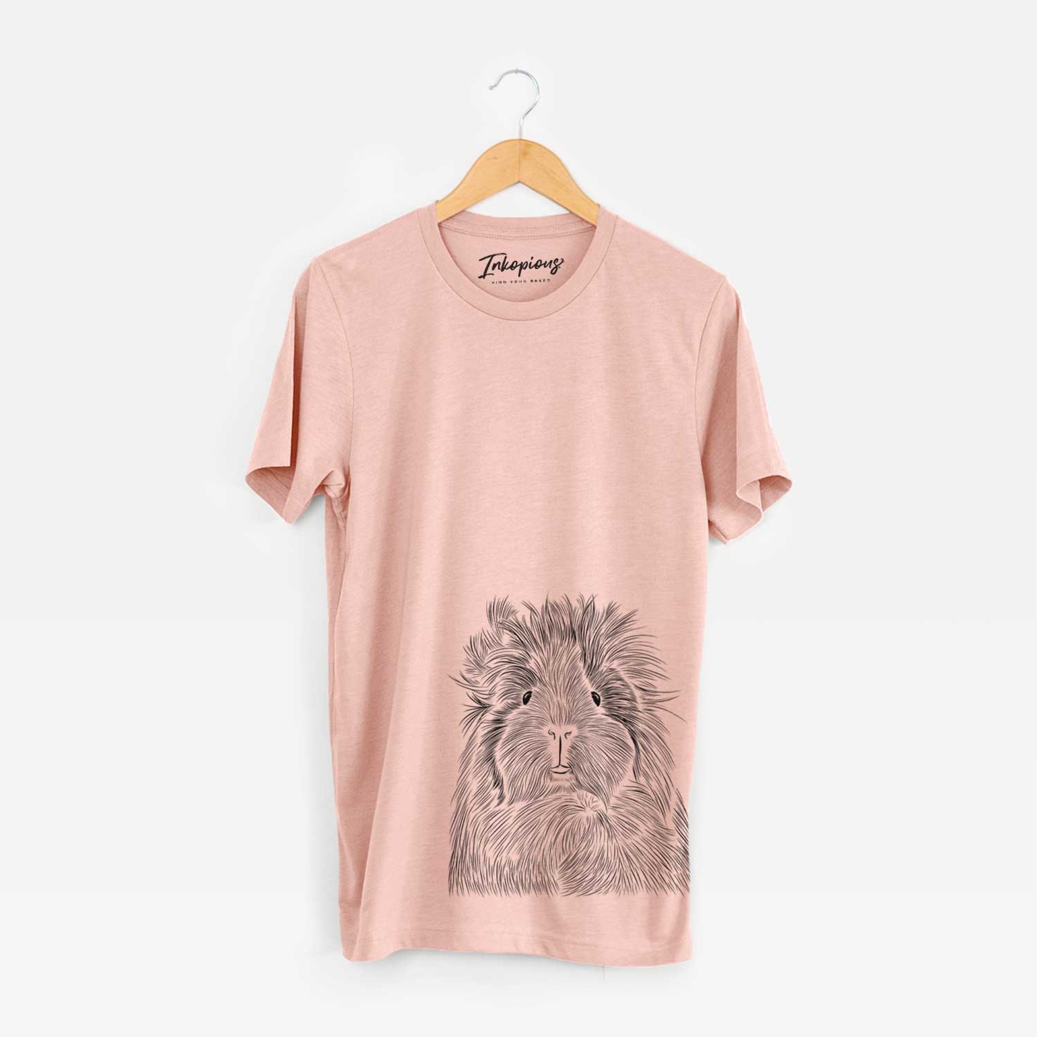 Hand-drawn sketch of Rhino the Guinea Pig on a Peach Unisex crewneck