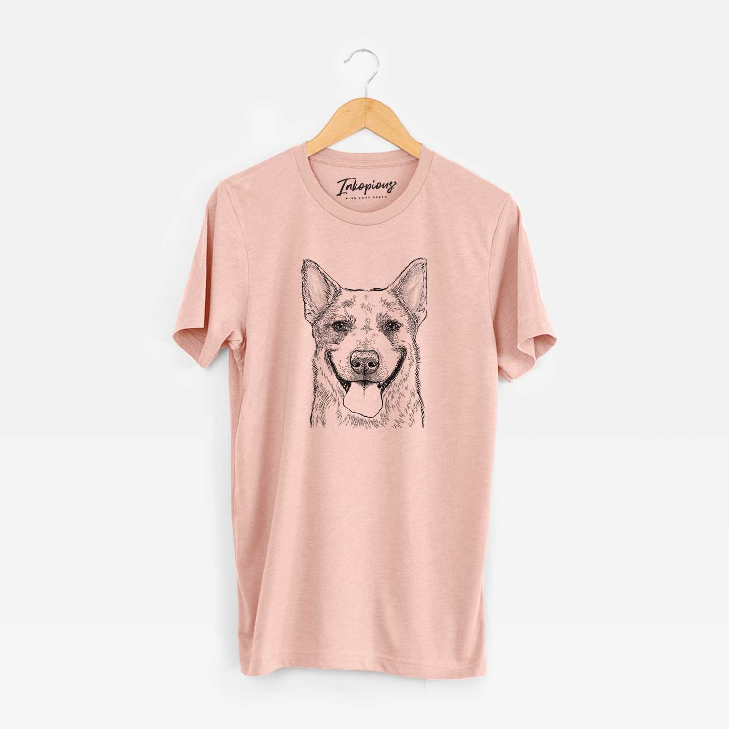 Hand-drawn sketch of Rio the Australian Cattle Dog on a Peach Unisex crewneck