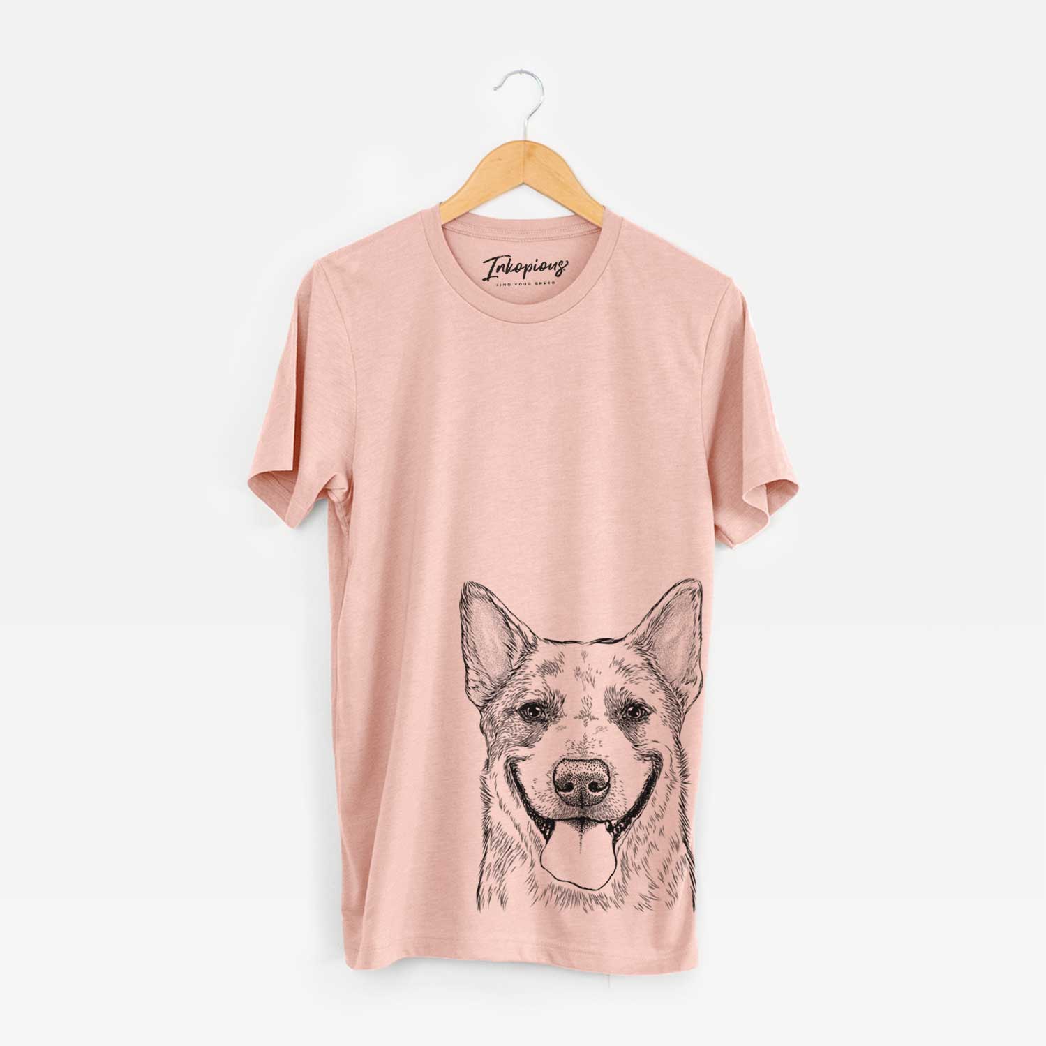 Hand-drawn sketch of Rio the Australian Cattle Dog on a Peach Unisex crewneck