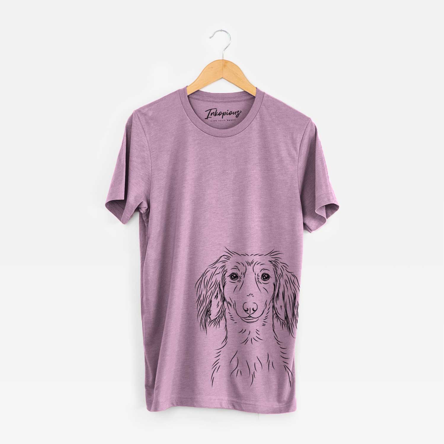 Hand-drawn sketch of Roux the Long Haired Dachshund on an Orchid Bella Canvas Unisex Crewneck