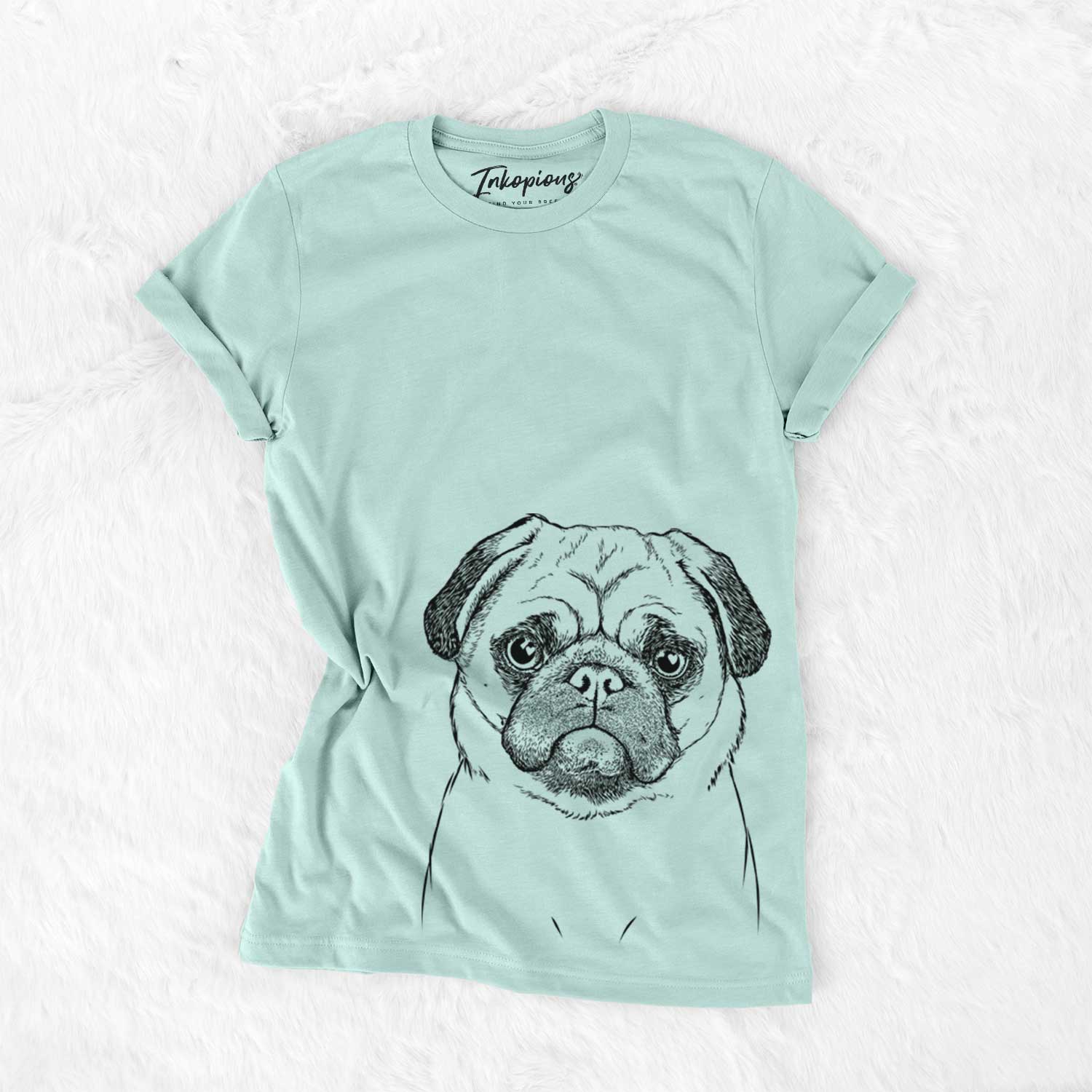 Hand-drawn sketch of Ruby the Pug on a Heather Sage Unisex crewneck
