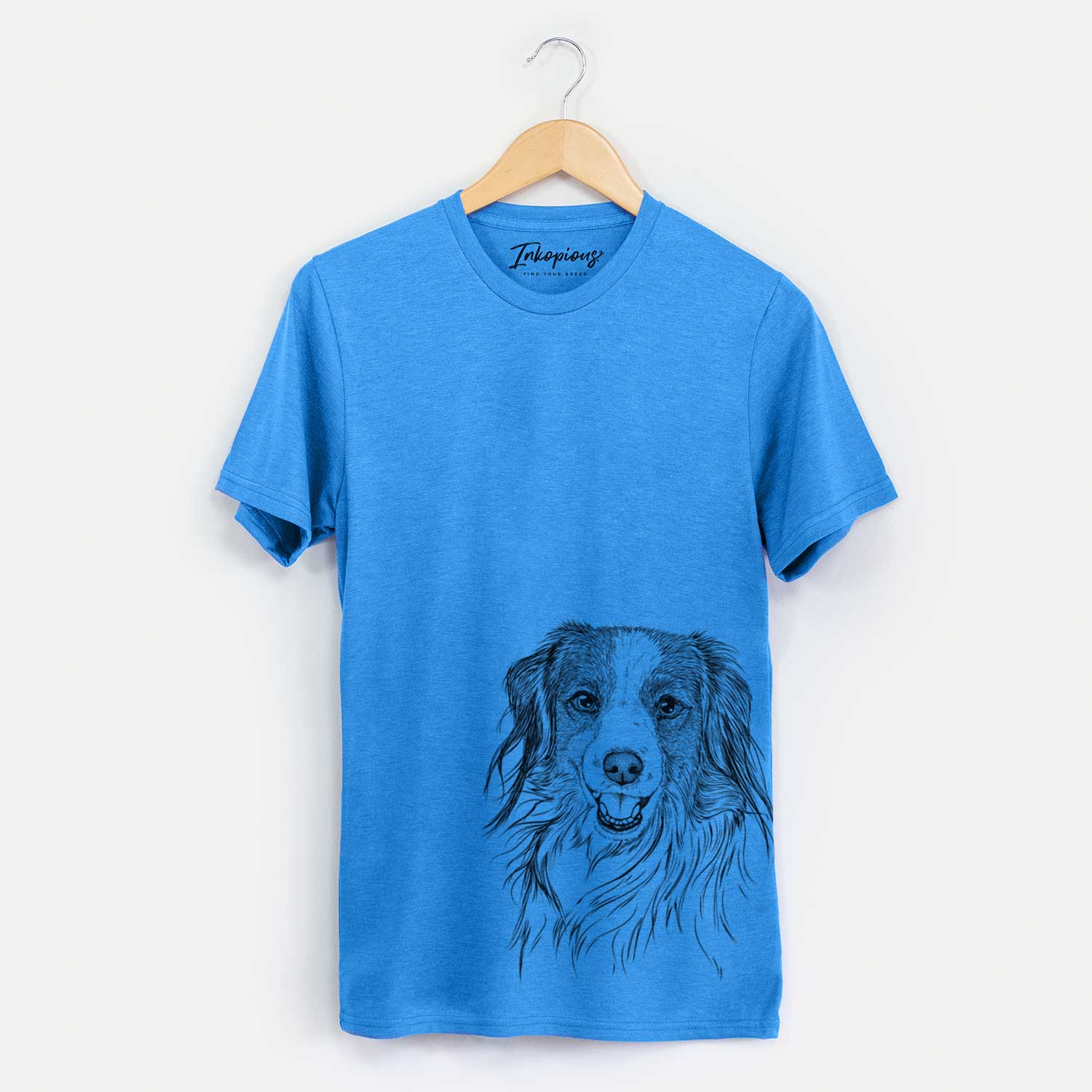 Hand-drawn sketch of Rutger the Nederlandse Kooikerhondje on a Blue Unisex crewneck