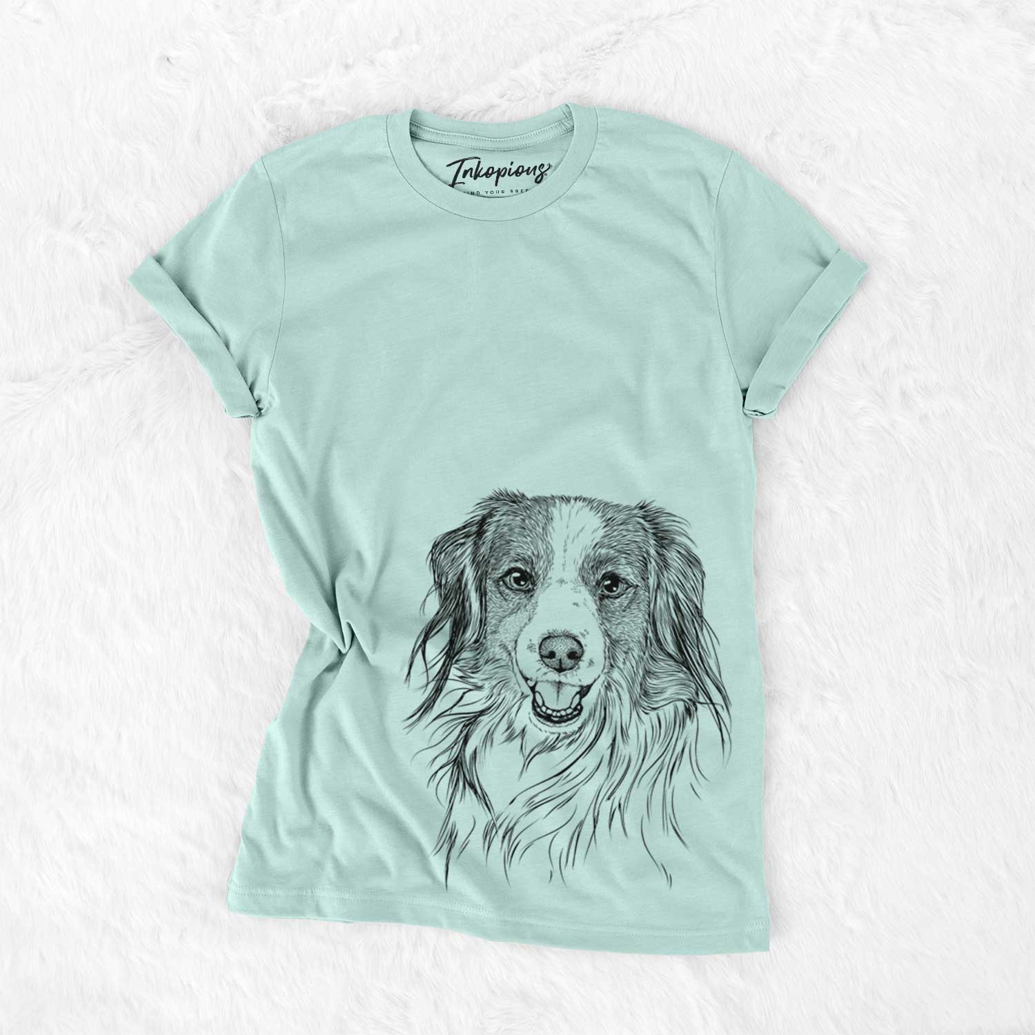 Hand-drawn sketch of Rutger the Nederlandse Kooikerhondje on a Heather Sage Unisex crewneck
