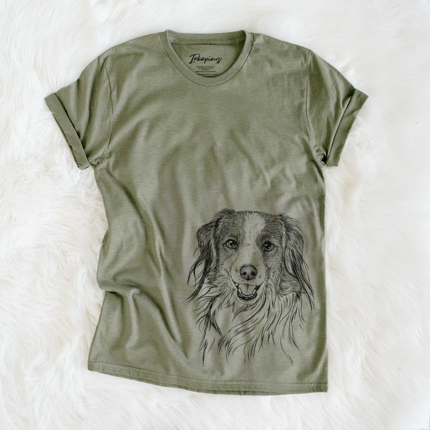 Hand-drawn sketch of Rutger the Nederlandse Kooikerhondje on an Olive Unisex crewneck