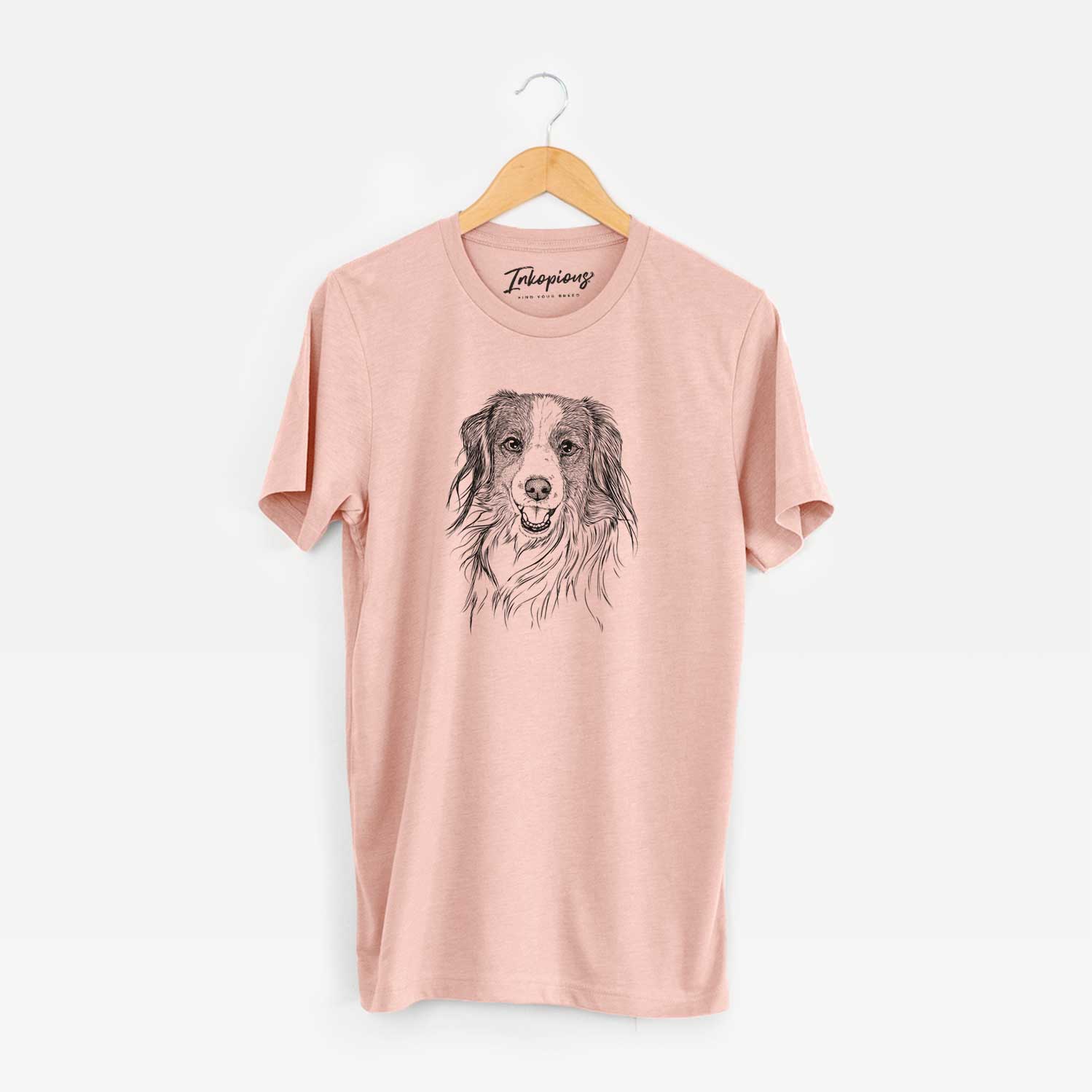 Hand-drawn sketch of Rutger the Nederlandse Kooikerhondje on a Peach Unisex crewneck