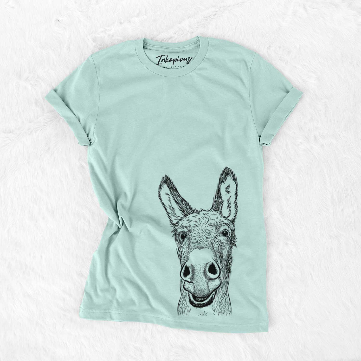 Hand-drawn sketch of Samule the Donkey on a Heather Sage Unisex crewneck