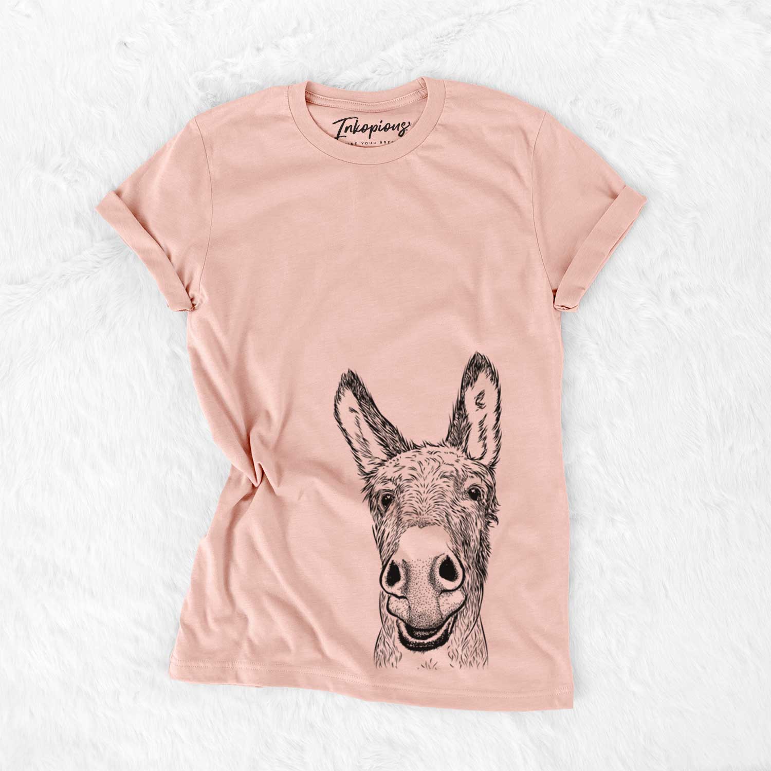 Hand-drawn sketch of Samule the Donkey on a Peach Bella Canvas Unisex Crewneck