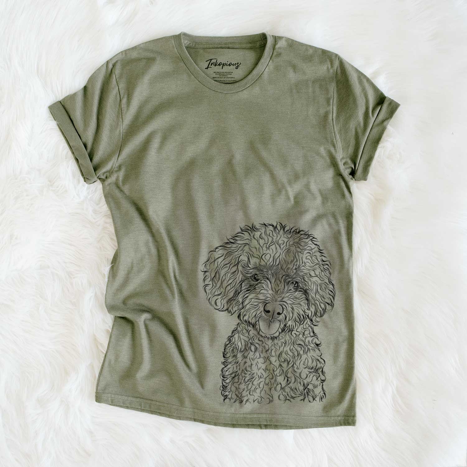 Hand-drawn sketch of Satsu the Micro Teacup Poodle on an Olive Unisex crewneck