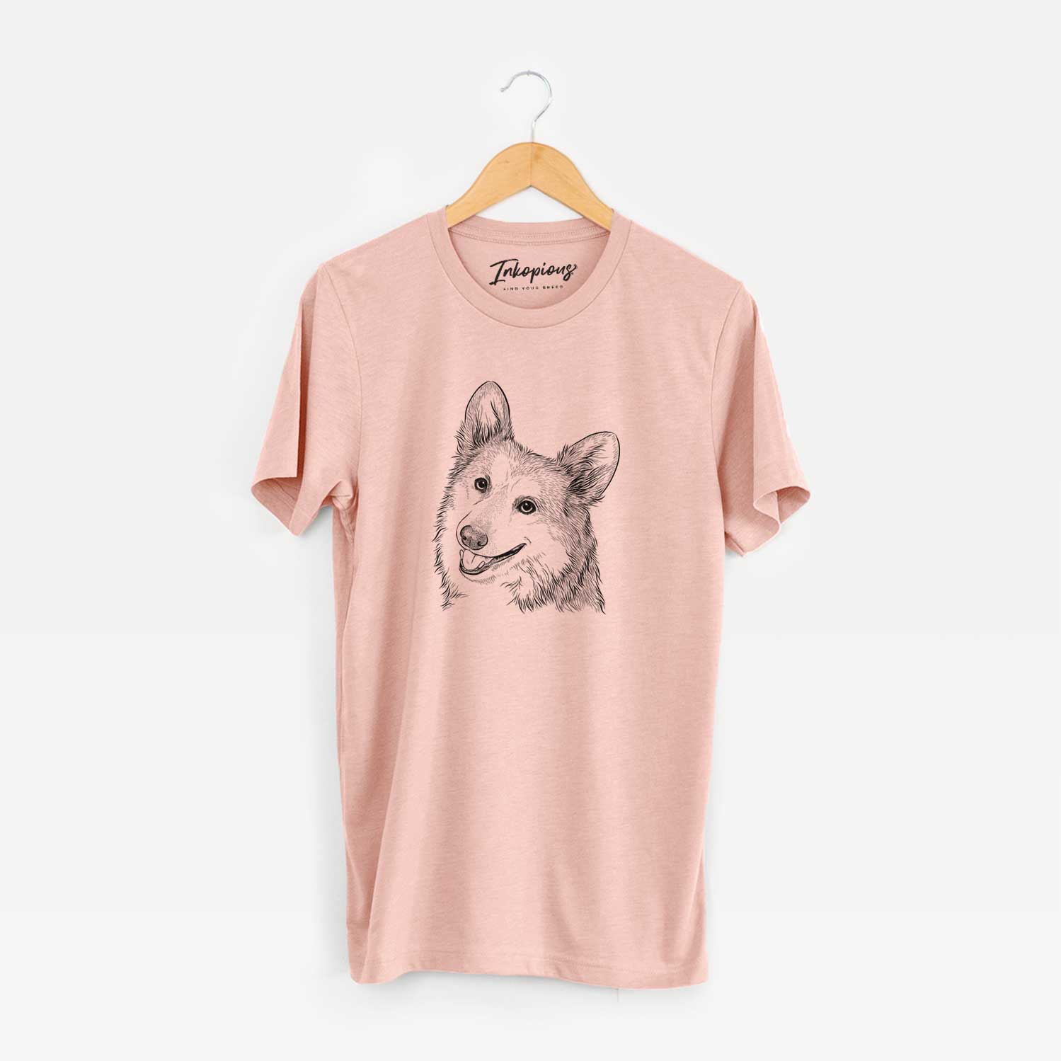 Hand-drawn sketch of Scout the Pembroke Welsh Corgi on a Peach Unisex crewneck