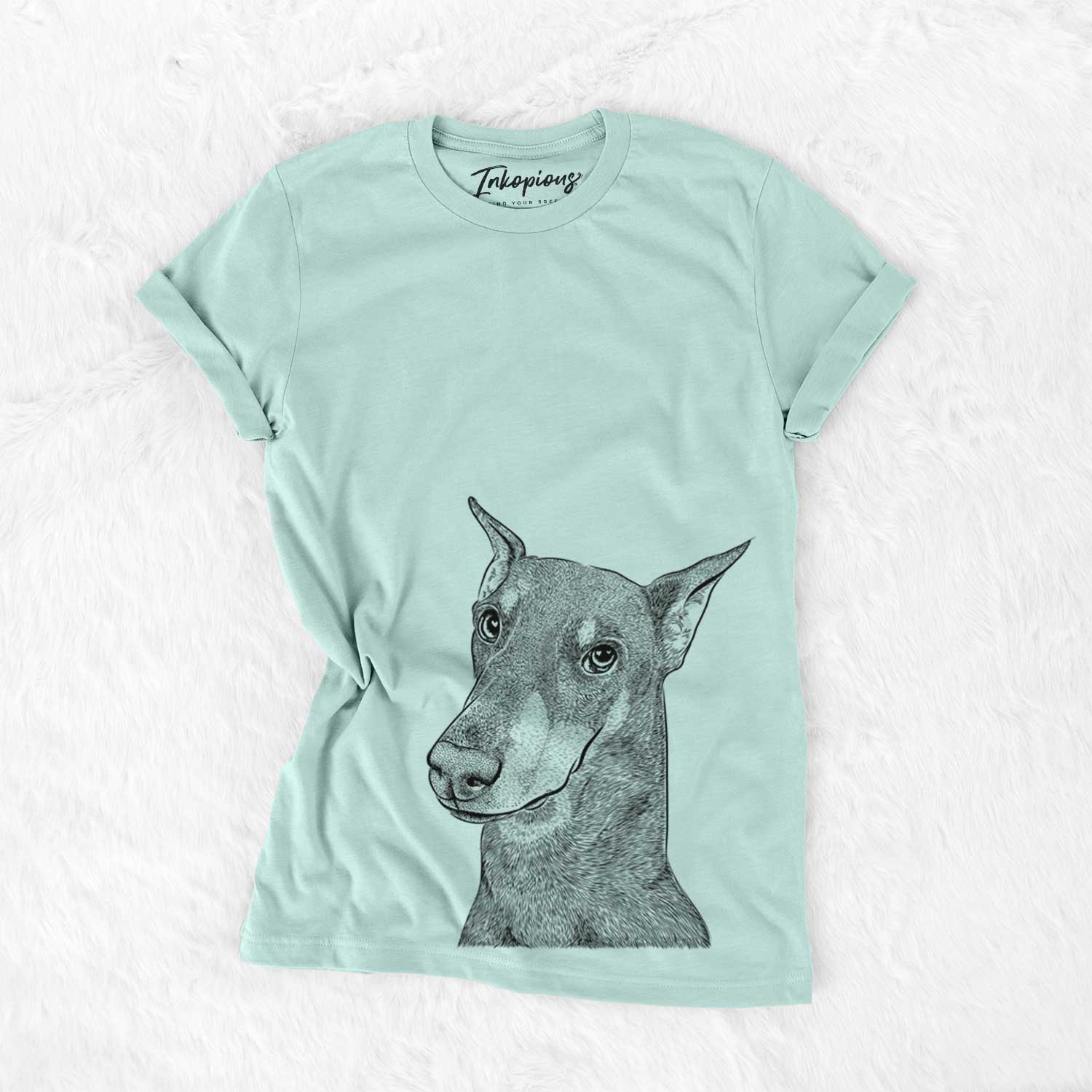 Hand-drawn sketch of Shelby the Doberman Pinscher on a Heather Sage Bella Canvas Unisex Crewneck