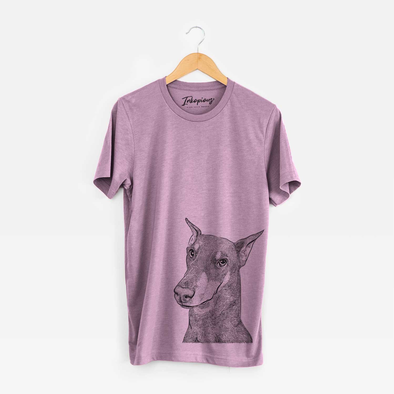 Hand-drawn sketch of Shelby the Doberman Pinscher on an Orchid Bella Canvas Unisex Crewneck
