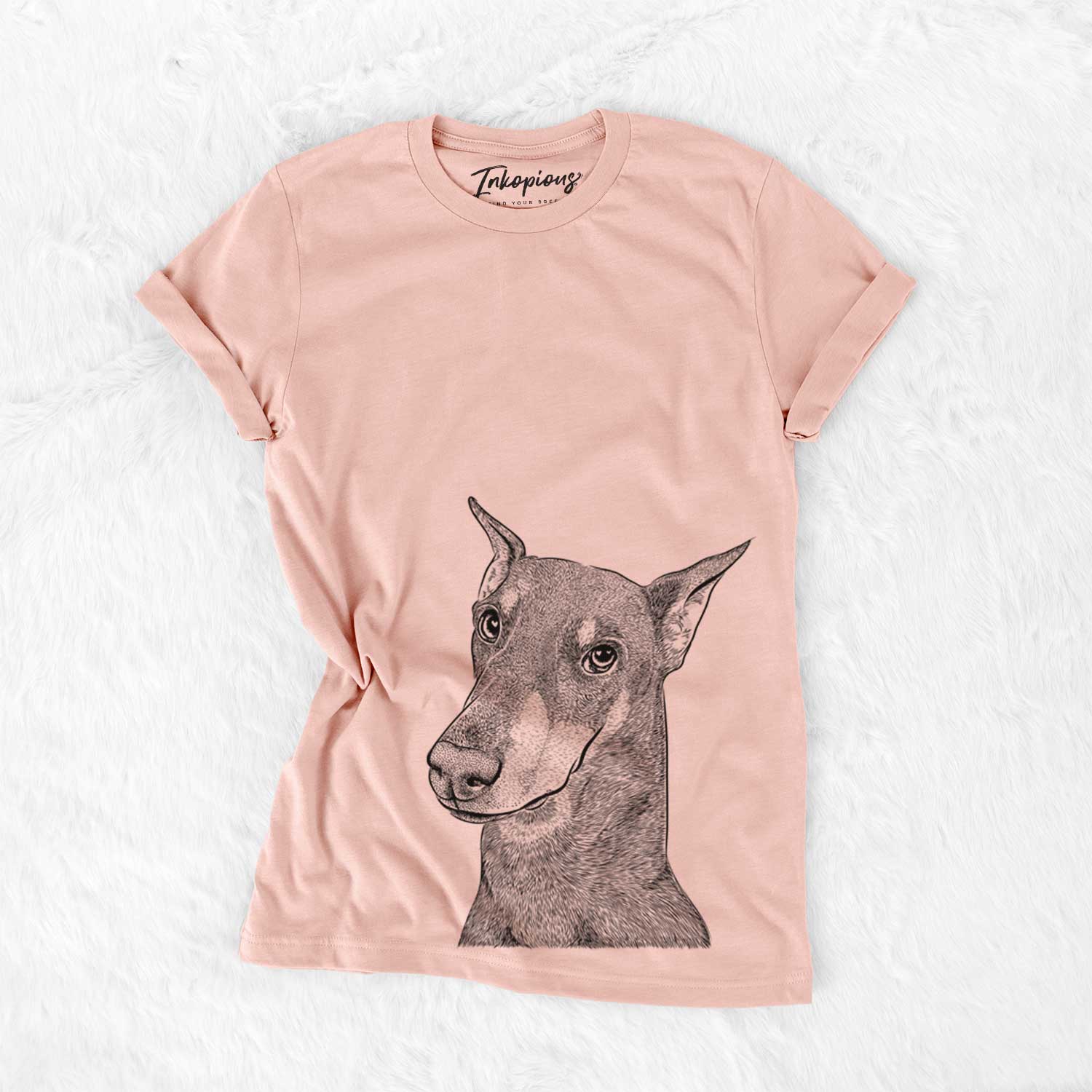 Hand-drawn sketch of Shelby the Doberman Pinscher on a Peach Bella Canvas Unisex Crewneck