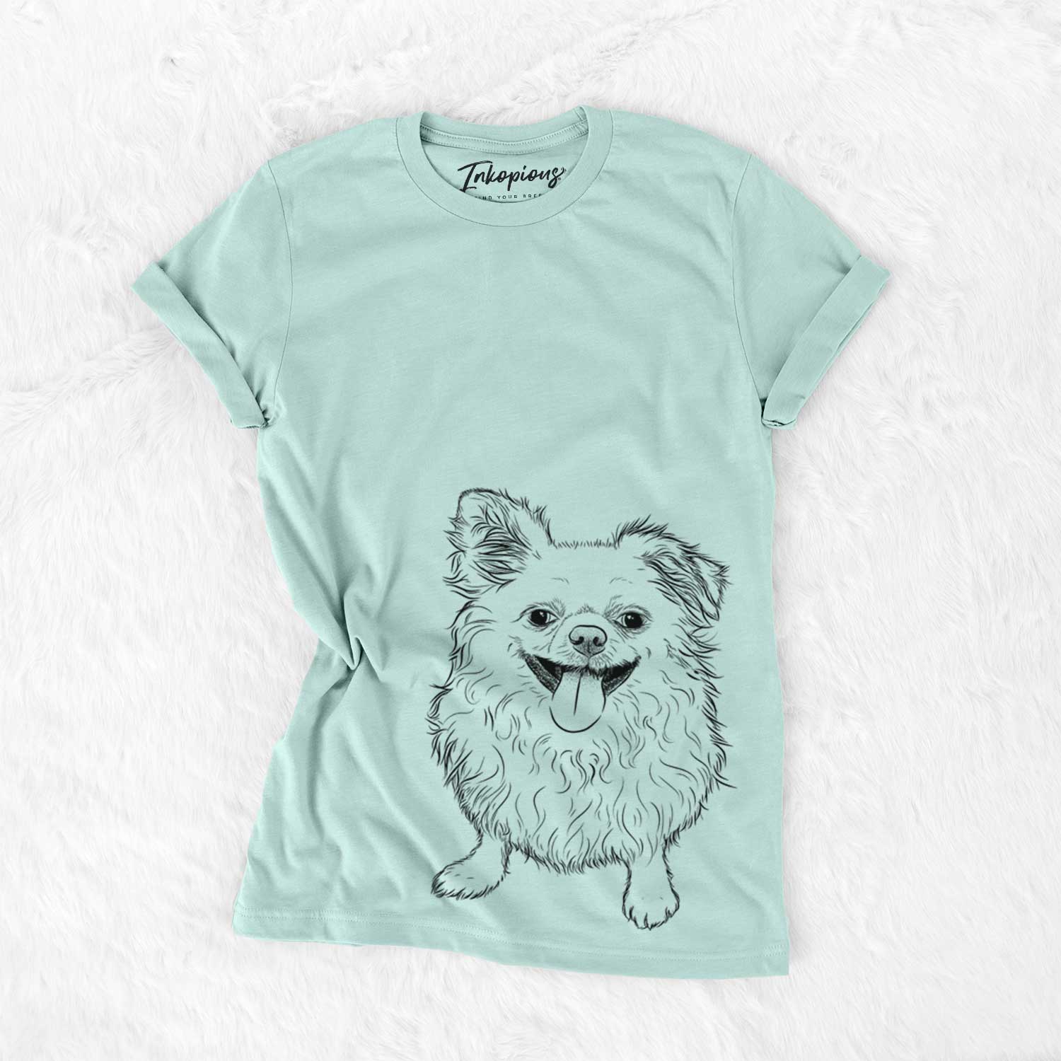 Hand-drawn sketch of Stuart the Longhaired Chihuahua on a Heather Sage Unisex crewneck