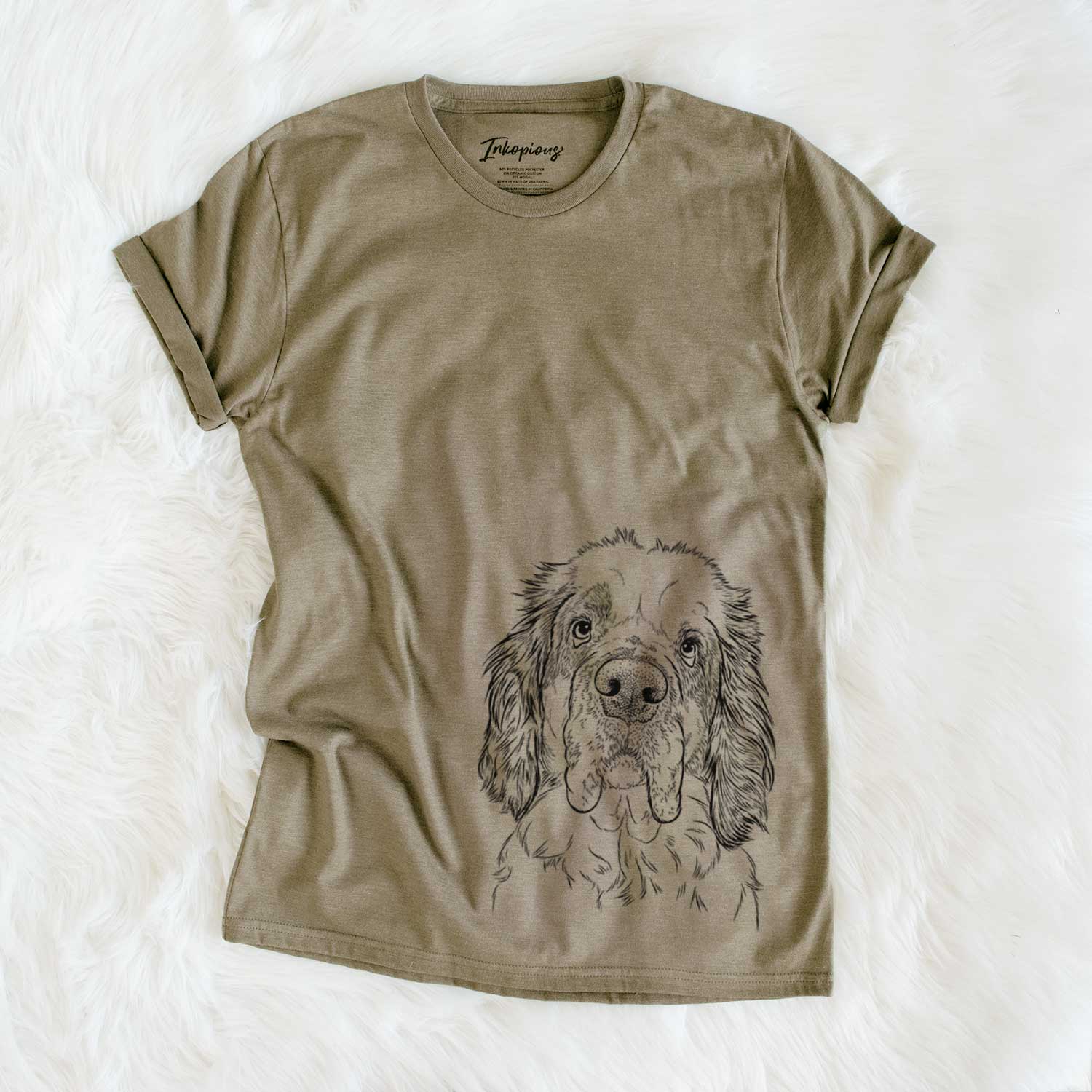 Hand-drawn sketch of Sully the Clumber Spaniel on an Olive Unisex crewneck