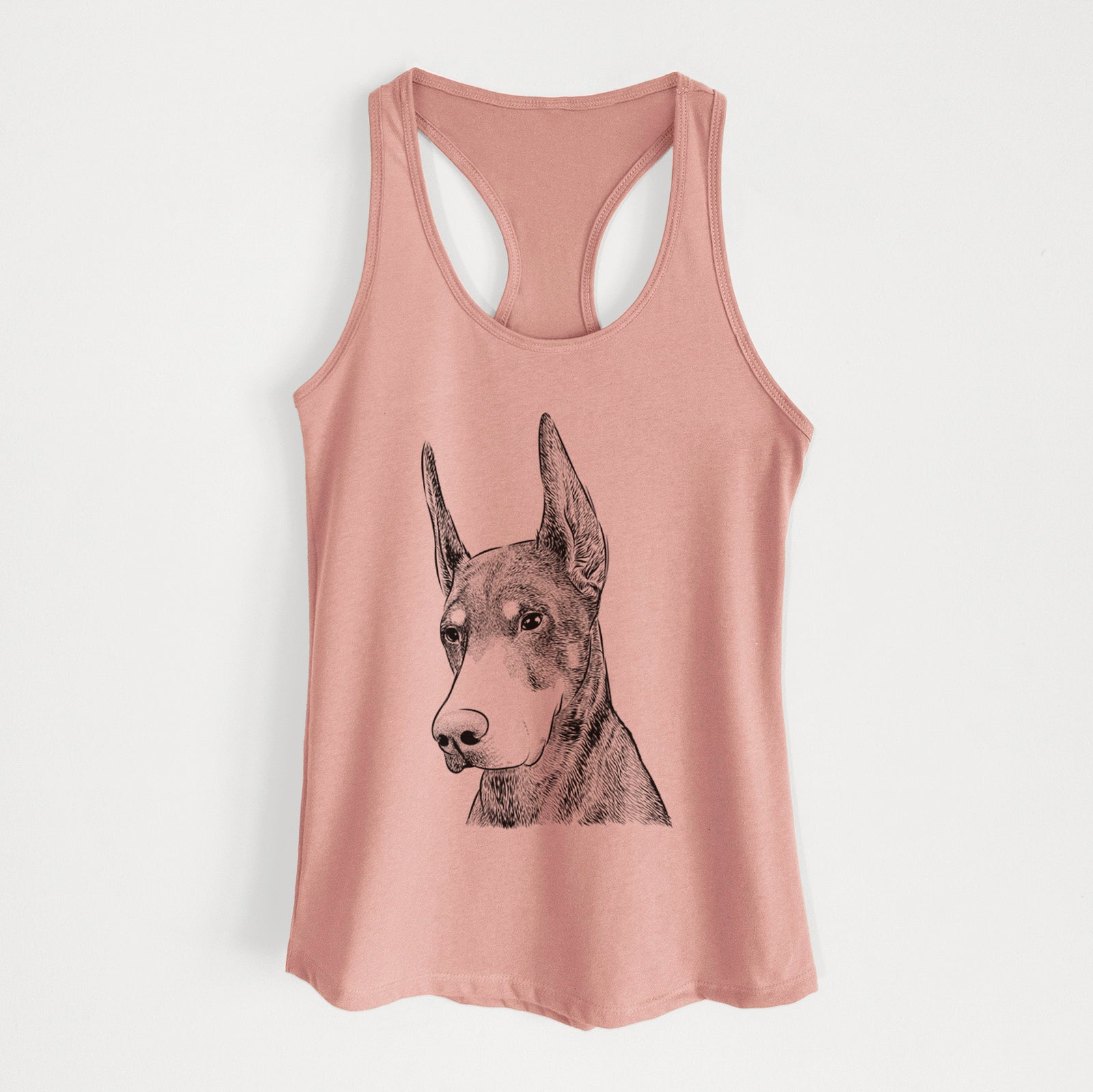 Hand-drawn sketch of Sunny the Doberman Pinscher on a Desert Pink Women's racerback tanktop