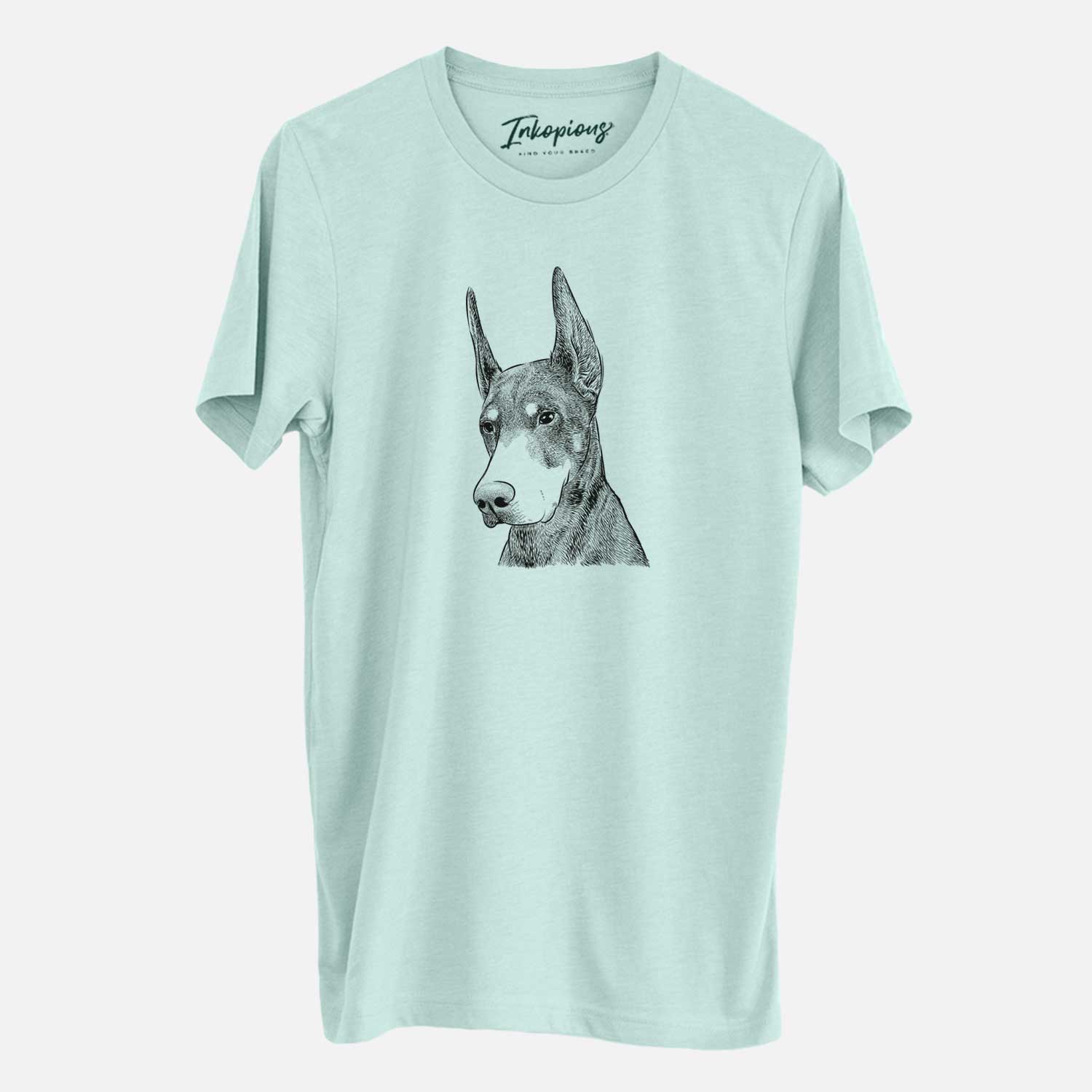 Hand-drawn sketch of Sunny the Doberman Pinscher on a Heather Sage Unisex crewneck
