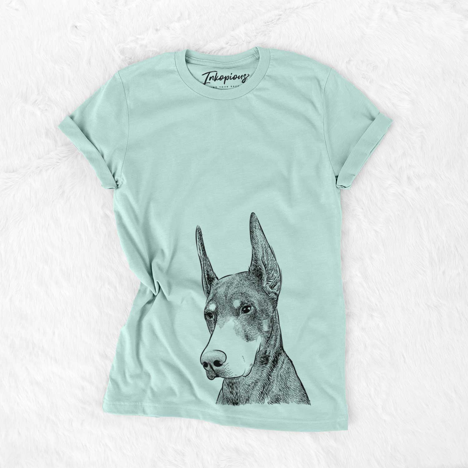 Hand-drawn sketch of Sunny the Doberman Pinscher on a Heather Sage Bella Canvas Unisex Crewneck