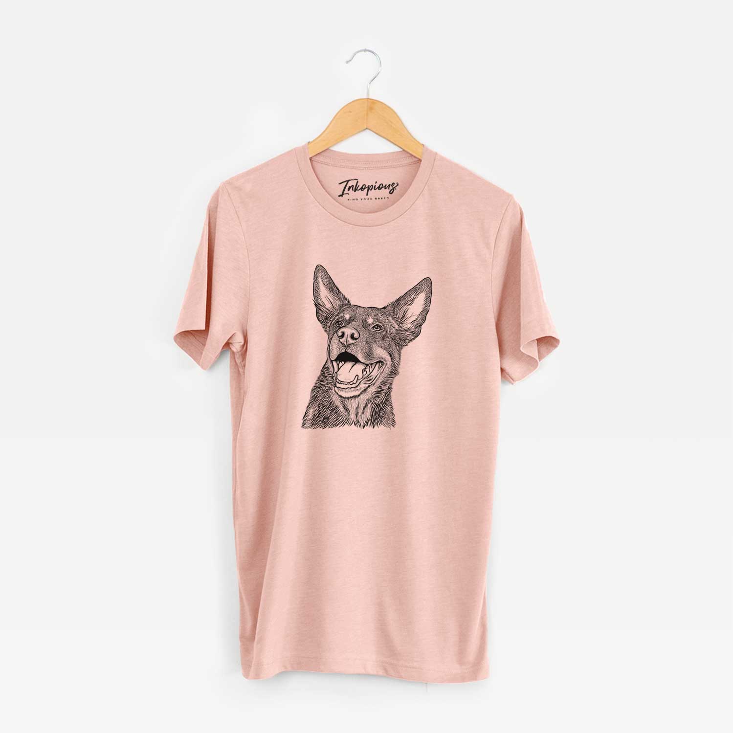 Hand-drawn sketch of Tucker the Australian Kelpie on a Peach Unisex crewneck