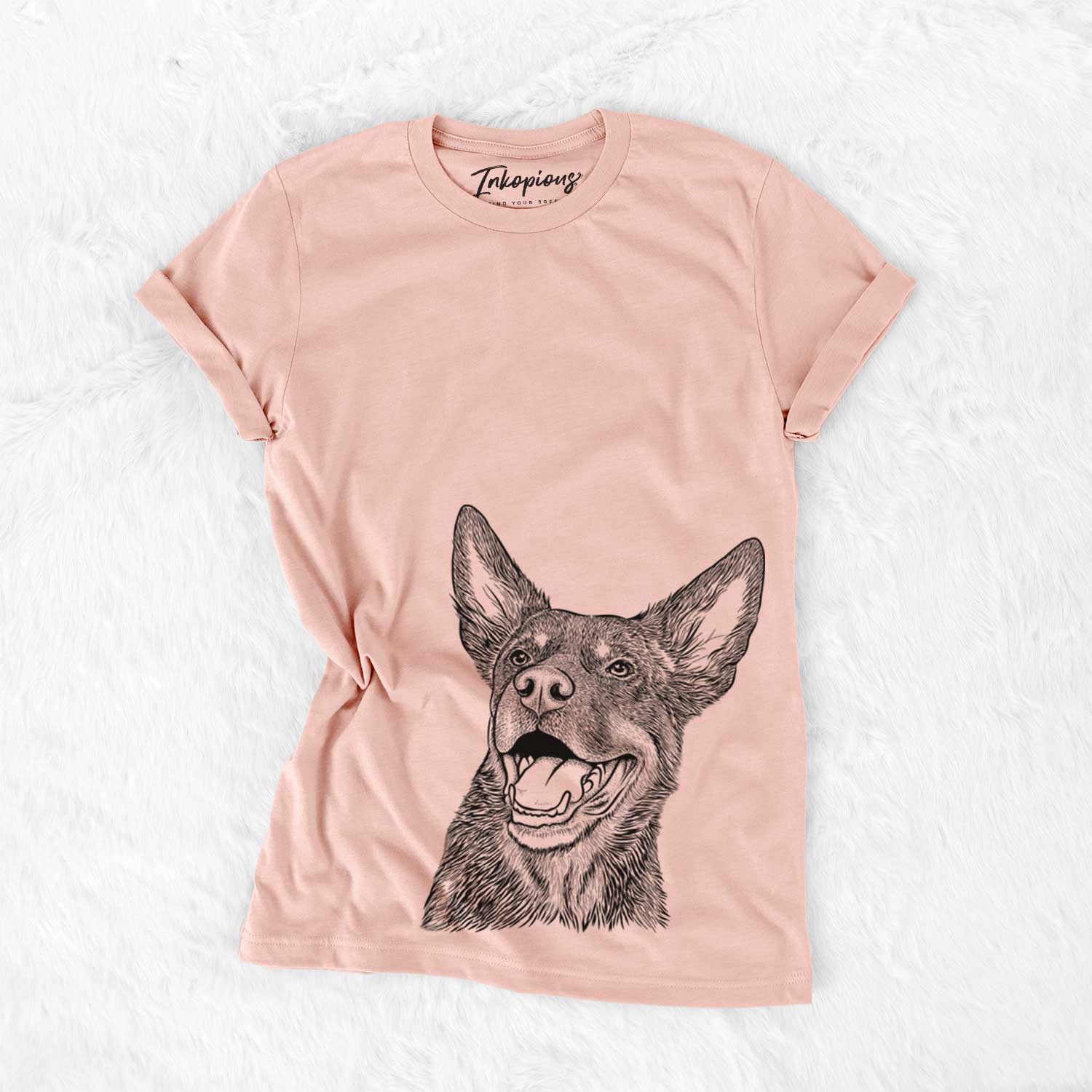 Hand-drawn sketch of Tucker the Australian Kelpie on a Peach Bella Canvas Unisex Crewneck