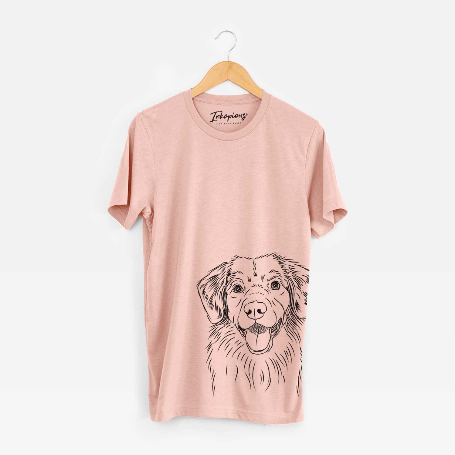 Hand-drawn sketch of Weston the Nova Scotia Duck Tolling Retriever on a Peach Bella Canvas Unisex Crewneck
